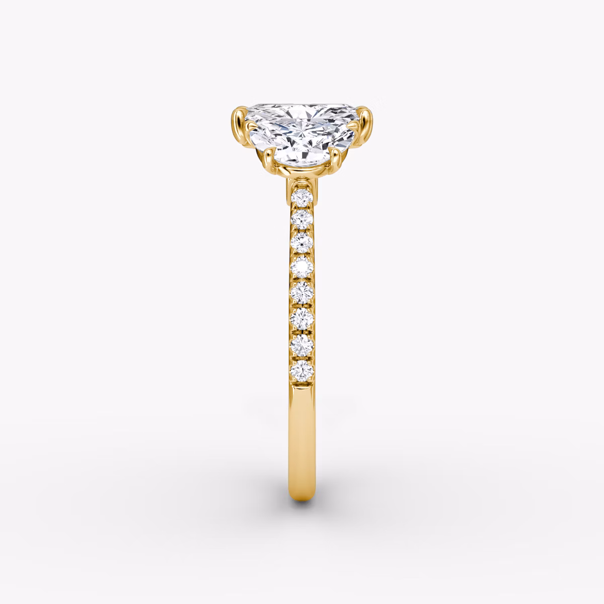 The Three Stone | Radiant | 18k | Yellow Gold | bandAccent: Pavé | sideStoneCarat: 0.50ct | sideStoneShape: Half Moon | diamondOrientation: vertical | caratWeight: other