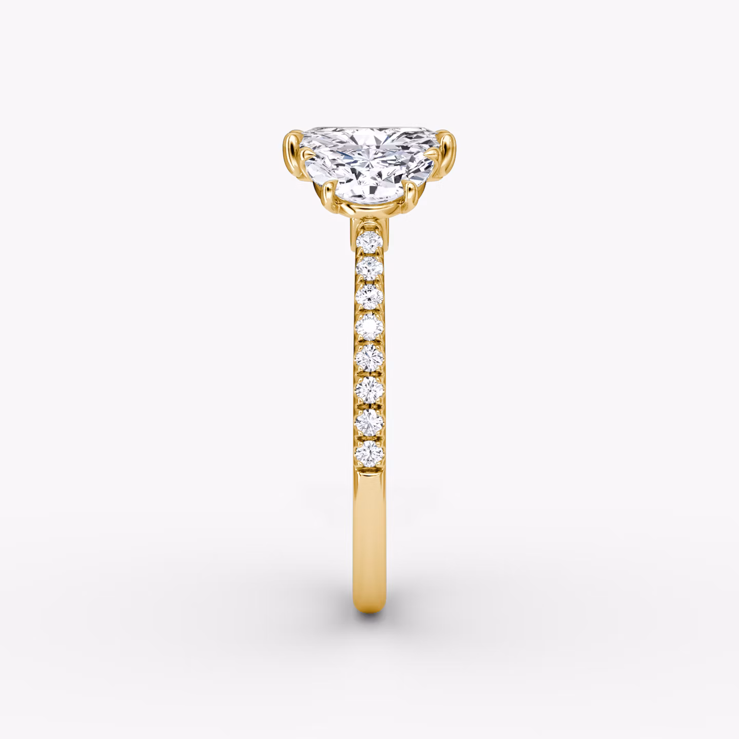 The Three Stone | Radiant | 18k | Yellow Gold | bandAccent: Pavé | sideStoneCarat: 0.50ct | sideStoneShape: Half Moon | diamondOrientation: vertical | caratWeight: other