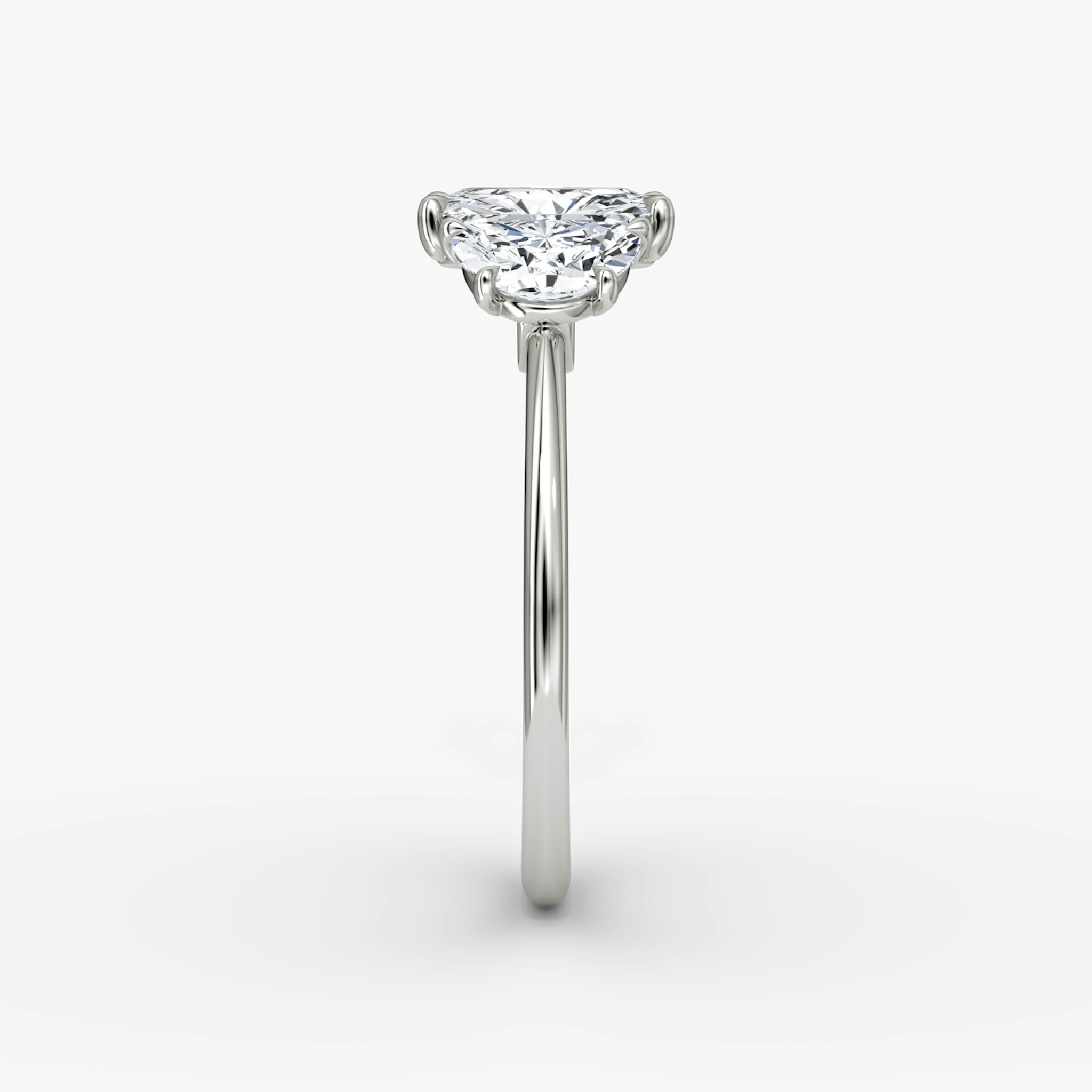 The Three Stone | Radiant | 18k | White Gold | bandAccent: Plain | sideStoneCarat: 0.50ct | sideStoneShape: Half Moon | diamondOrientation: vertical | caratWeight: other