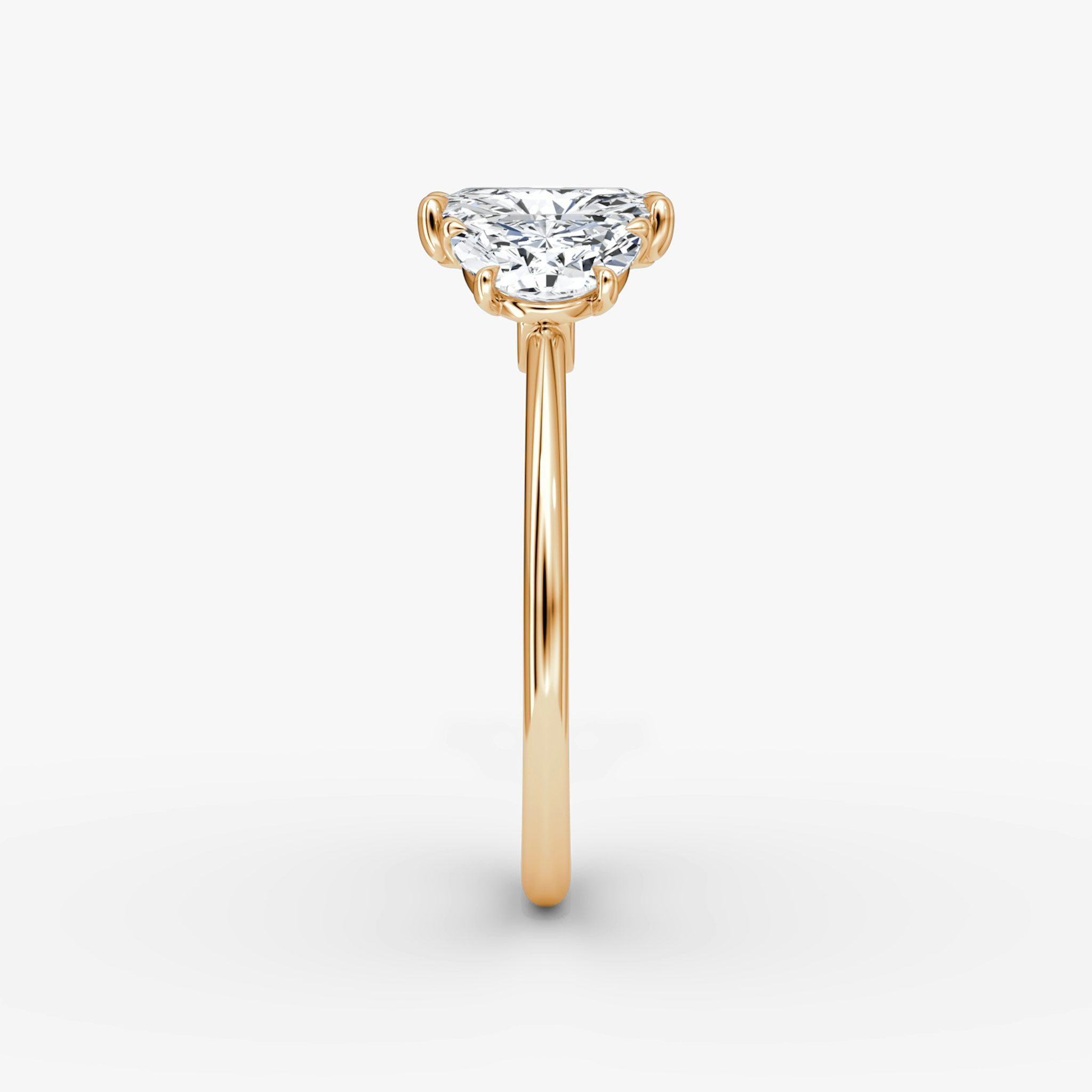 The Three Stone | Radiant | 14k | Rose Gold | bandAccent: Plain | sideStoneCarat: 0.50ct | sideStoneShape: Half Moon | diamondOrientation: vertical | caratWeight: other