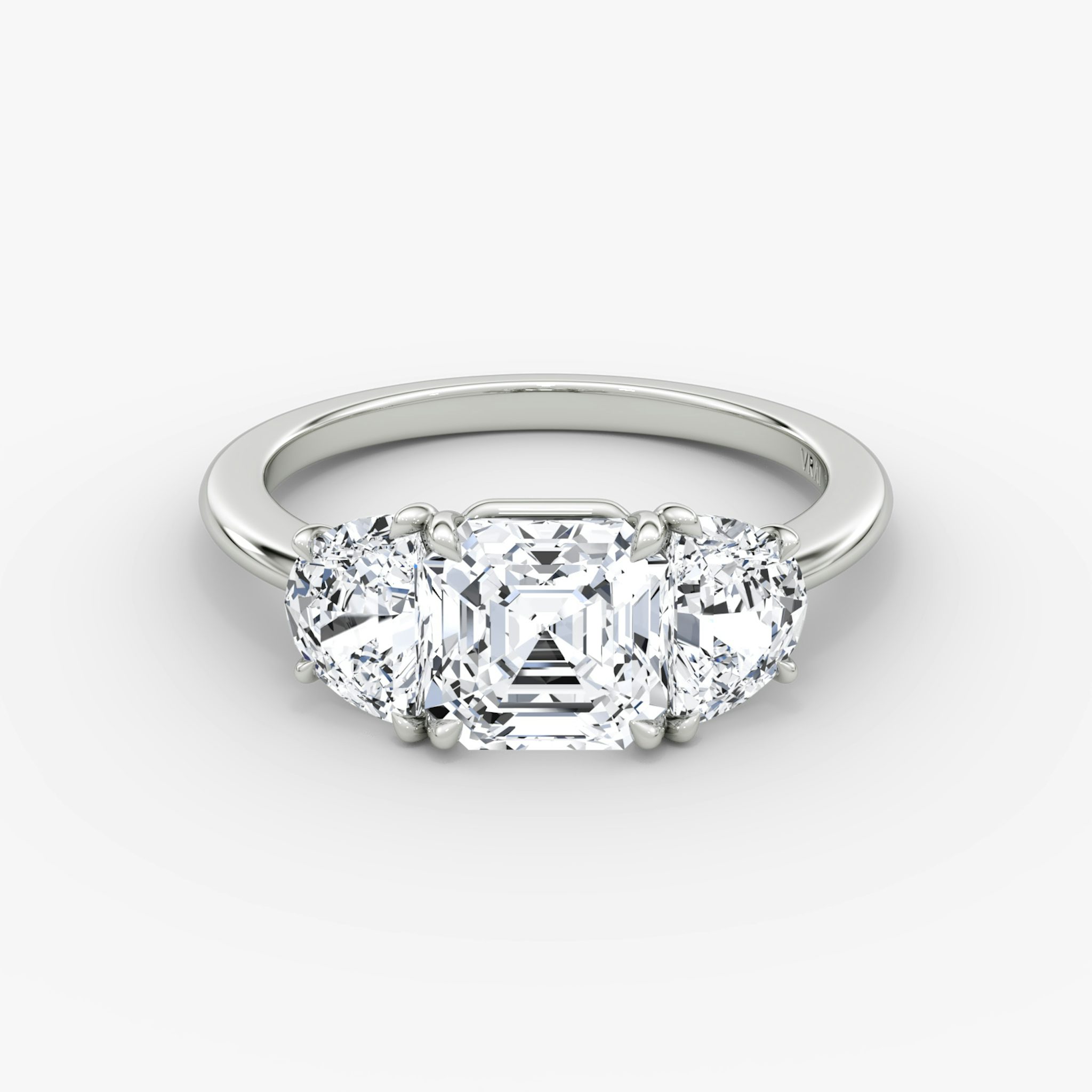 The Three Stone | Asscher | Platinum | bandAccent: Plain | sideStoneCarat: 0.50ct | sideStoneShape: Half Moon | diamondOrientation: vertical | caratWeight: other