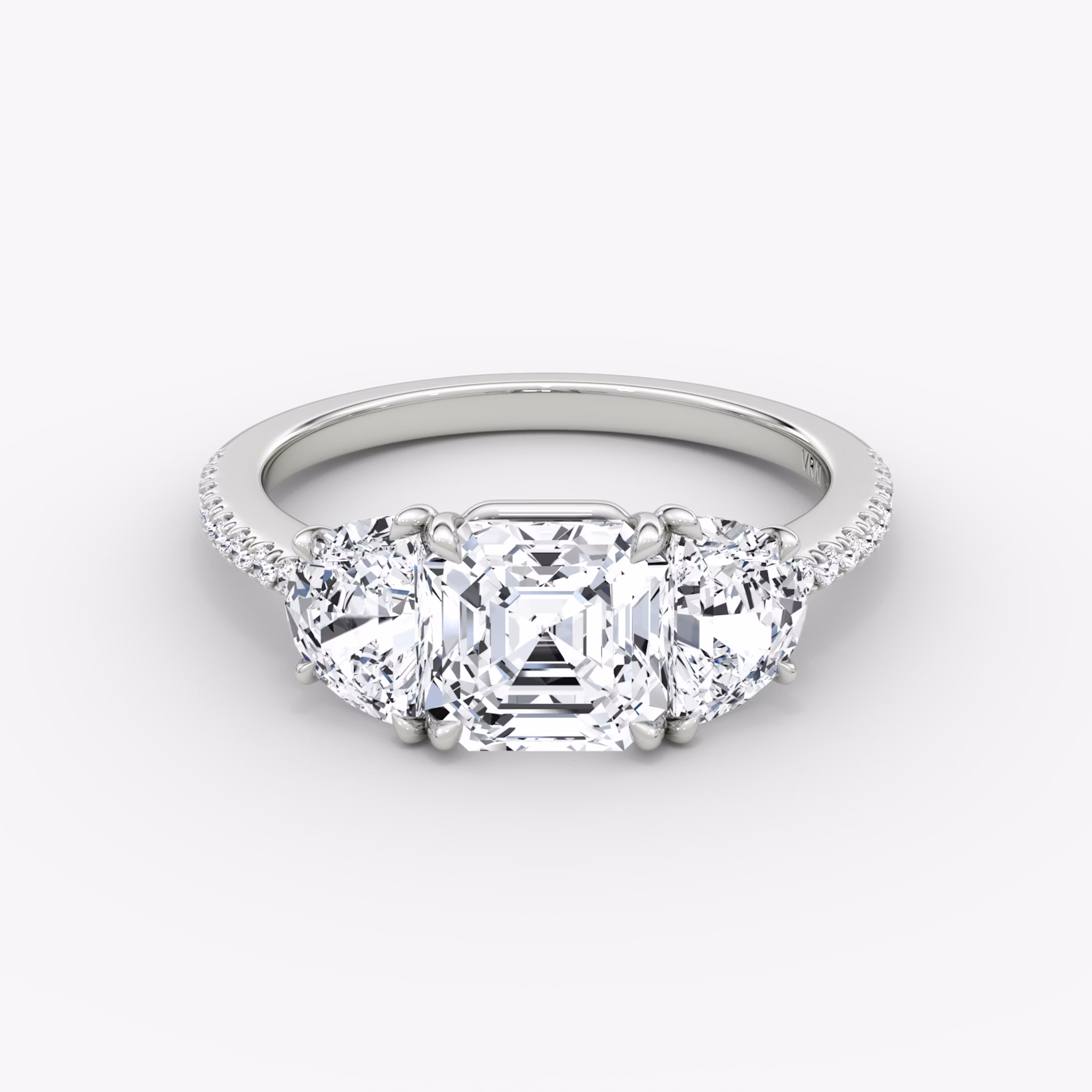 The Three Stone | Asscher | 18k | White Gold | bandAccent: Pavé | sideStoneCarat: 0.50ct | sideStoneShape: Half Moon | diamondOrientation: vertical | caratWeight: other