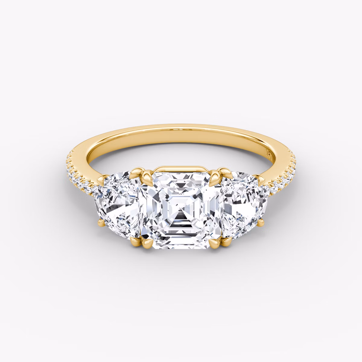 The Three Stone | Asscher | 18k | Yellow Gold | bandAccent: Pavé | sideStoneCarat: 0.50ct | sideStoneShape: Half Moon | diamondOrientation: vertical | caratWeight: other