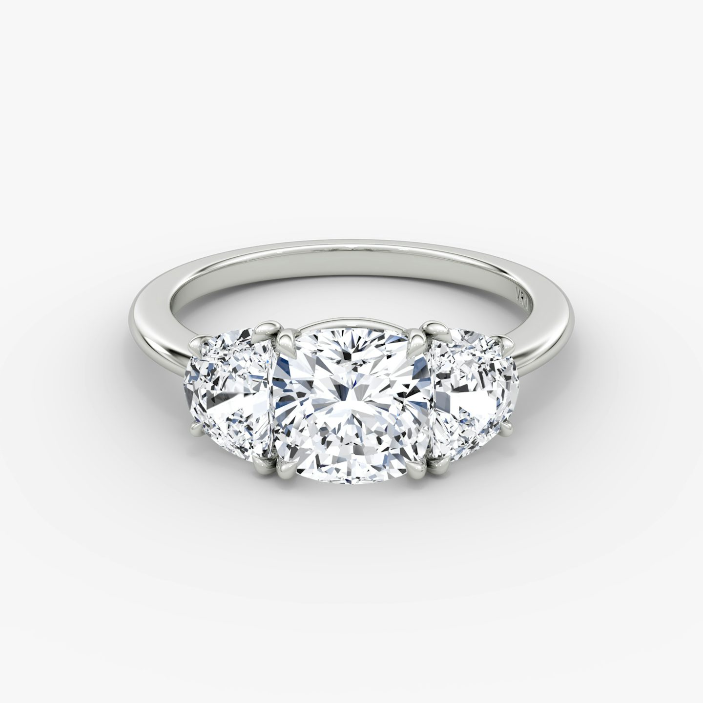 The Three Stone | Cushion | Platinum | bandAccent: Plain | sideStoneCarat: 0.50ct | sideStoneShape: Half Moon | diamondOrientation: vertical | caratWeight: other