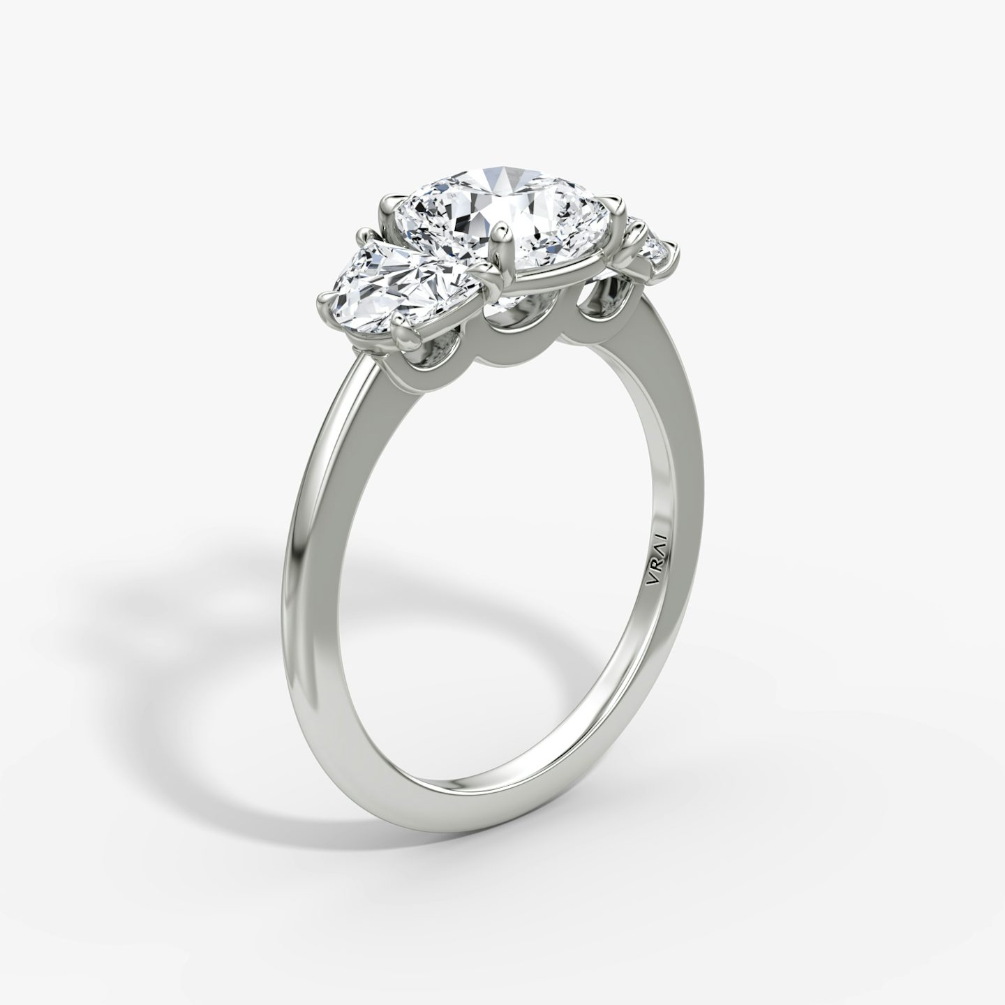 The Three Stone | Cushion | Platinum | bandAccent: Plain | sideStoneCarat: 0.50ct | sideStoneShape: Half Moon | diamondOrientation: vertical | caratWeight: other