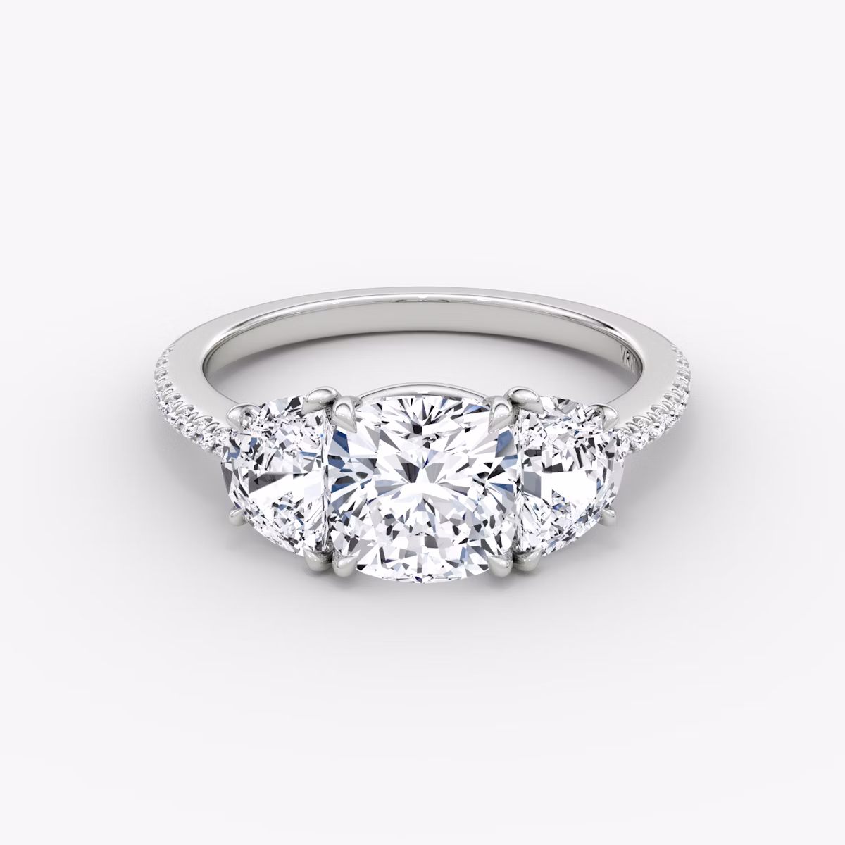 The Three Stone | Cushion | Platinum | bandAccent: Pavé | sideStoneCarat: 0.50ct | sideStoneShape: Half Moon | diamondOrientation: vertical | caratWeight: other