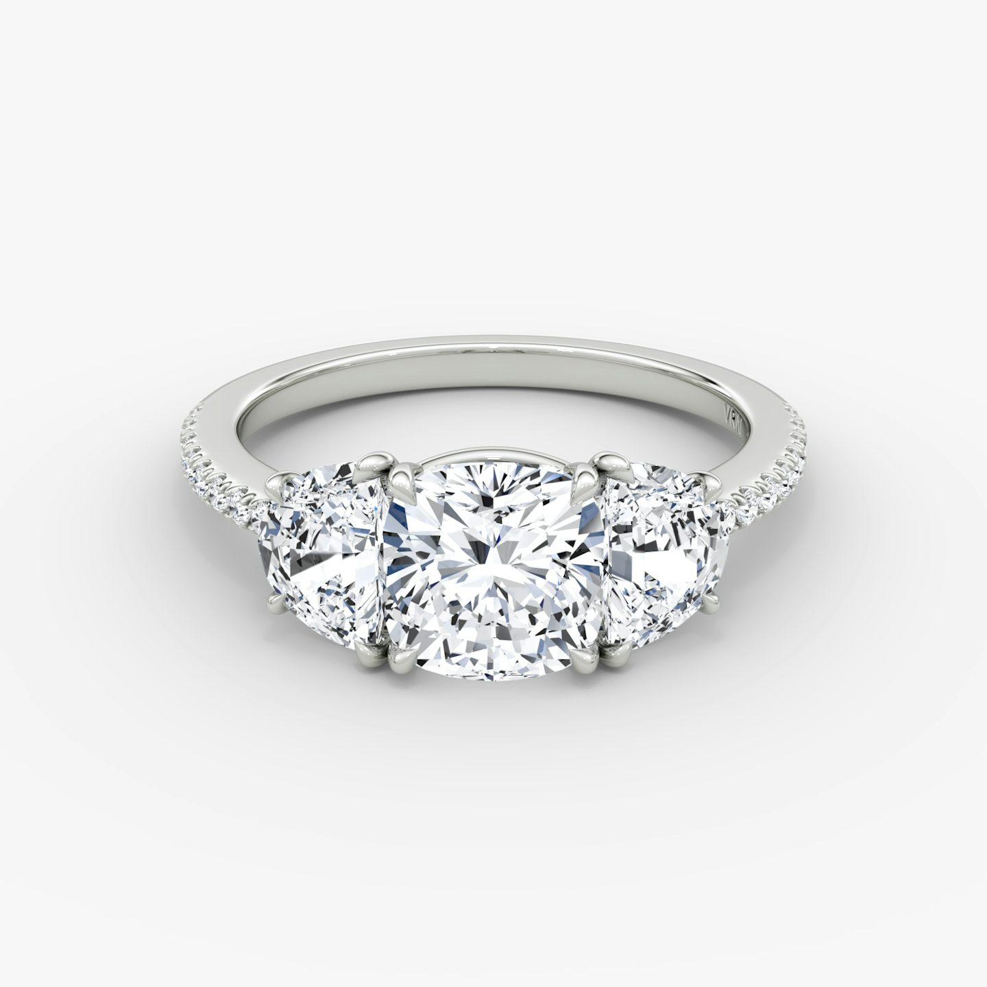 The Three Stone | Cushion | Platinum | bandAccent: Pavé | sideStoneCarat: 0.50ct | sideStoneShape: Half Moon | diamondOrientation: vertical | caratWeight: other