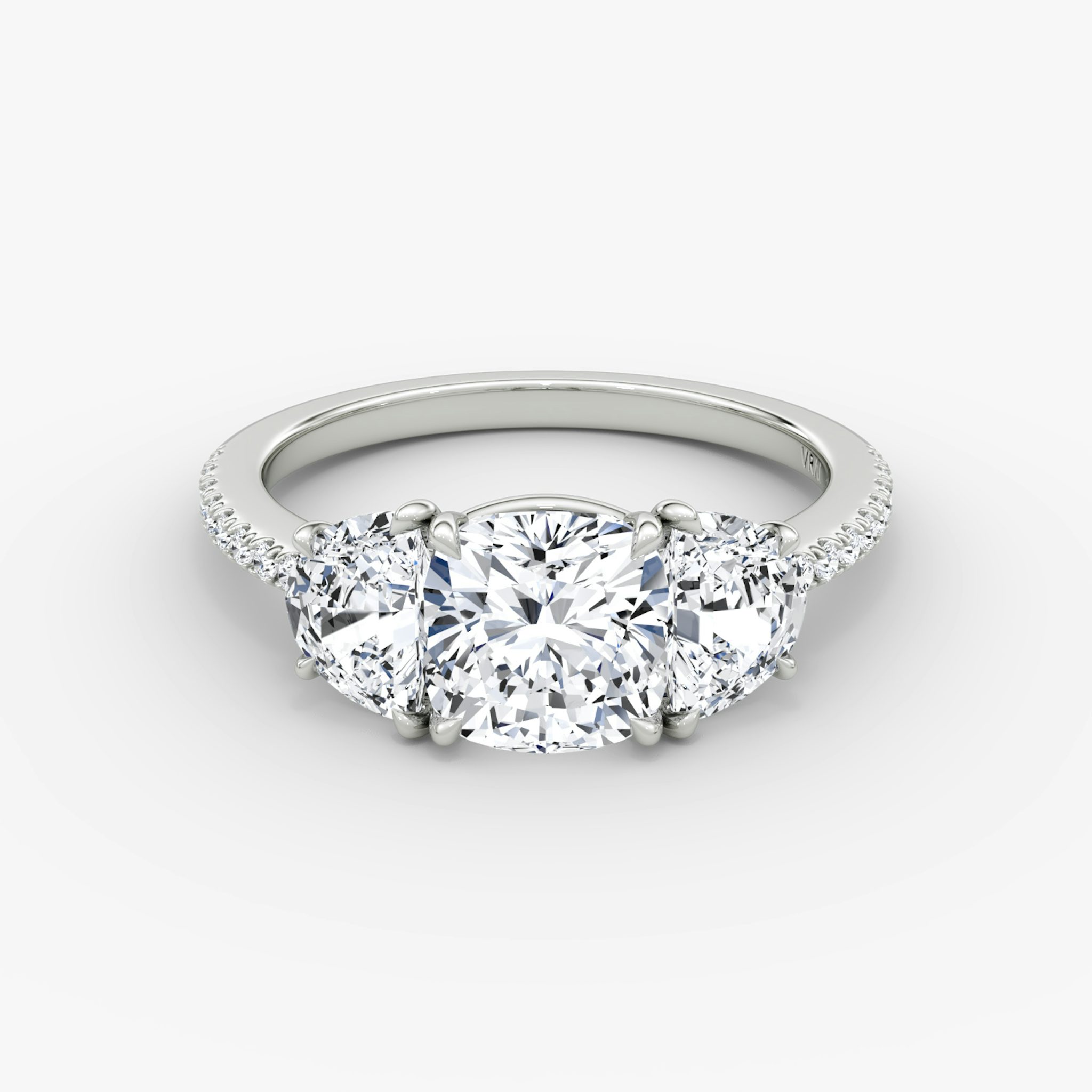 The Three Stone | Cushion | 18k | White Gold | bandAccent: Pavé | sideStoneCarat: 0.50ct | sideStoneShape: Half Moon | diamondOrientation: vertical | caratWeight: other