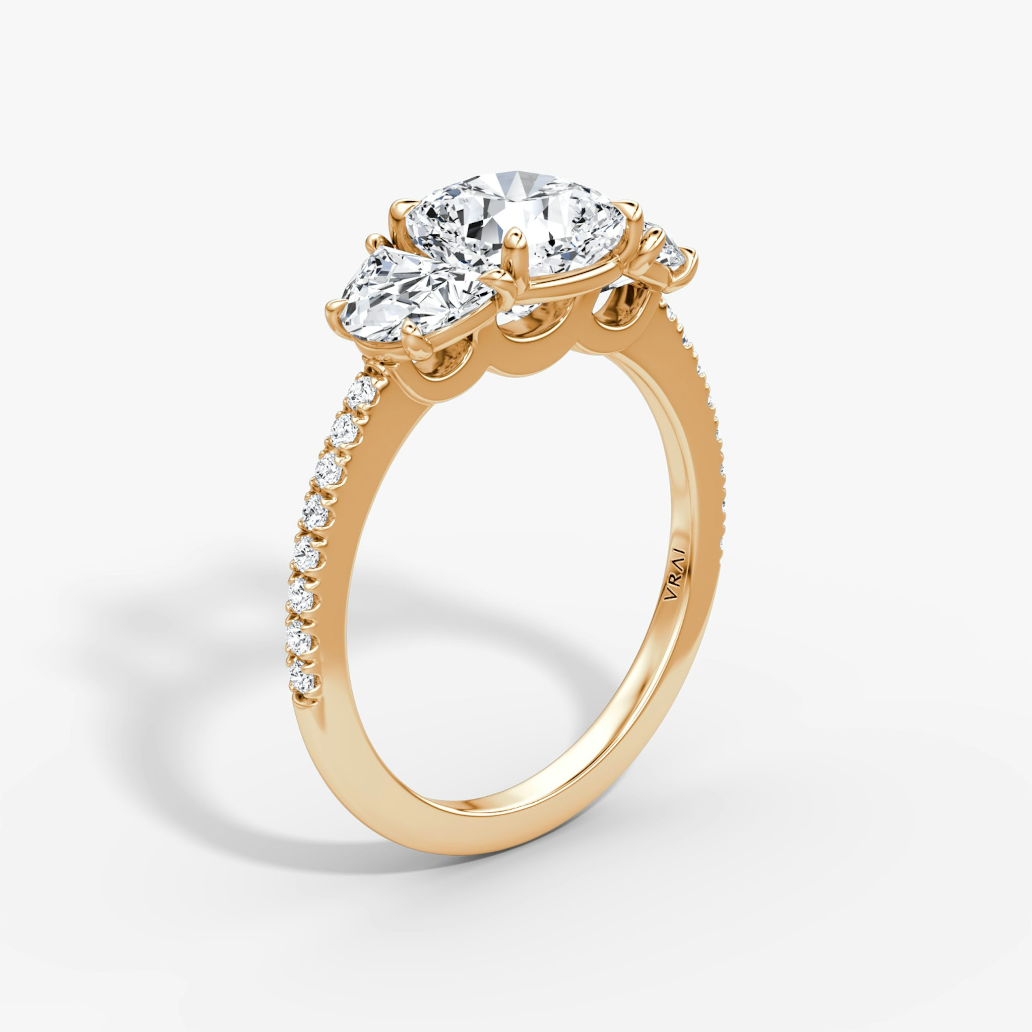 The Three Stone | Cushion | 14k | Rose Gold | bandAccent: Pavé | sideStoneCarat: 0.50ct | sideStoneShape: Half Moon | diamondOrientation: vertical | caratWeight: other
