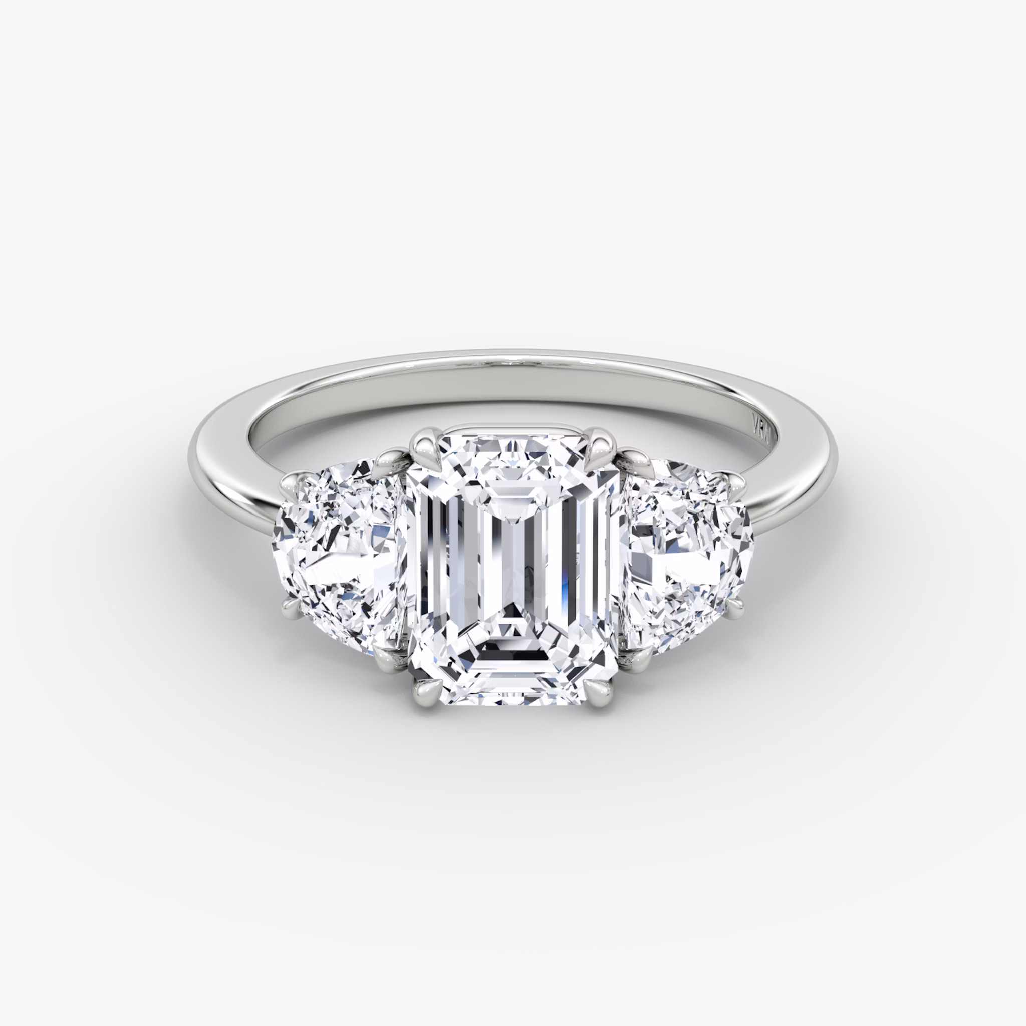 The Three Stone | Emerald | 18k | White Gold | bandAccent: Plain | sideStoneCarat: 0.50ct | sideStoneShape: Half Moon | diamondOrientation: vertical | caratWeight: other