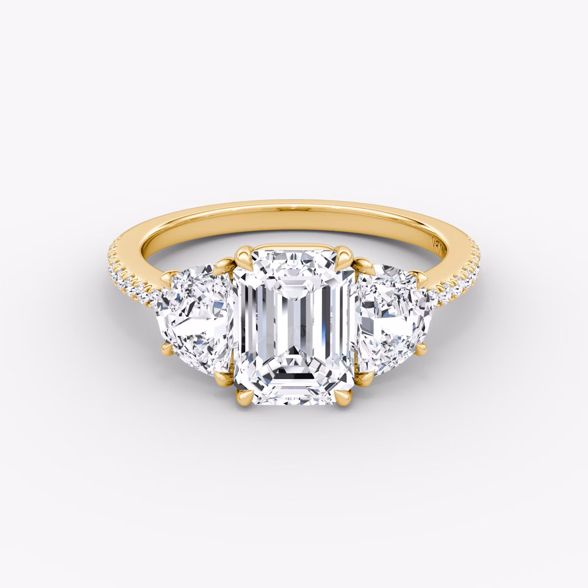 The Three Stone | Emerald | 18k | Yellow Gold | bandAccent: Pavé | sideStoneCarat: 0.50ct | sideStoneShape: Half Moon | diamondOrientation: vertical | caratWeight: other