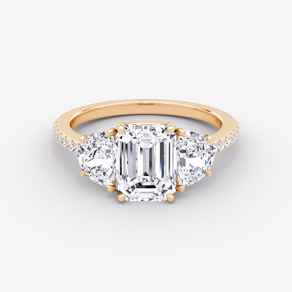 The Three Stone | Emerald | 14k | Rose Gold | bandAccent: Pavé | sideStoneCarat: 0.50ct | sideStoneShape: Half Moon | diamondOrientation: vertical | caratWeight: other