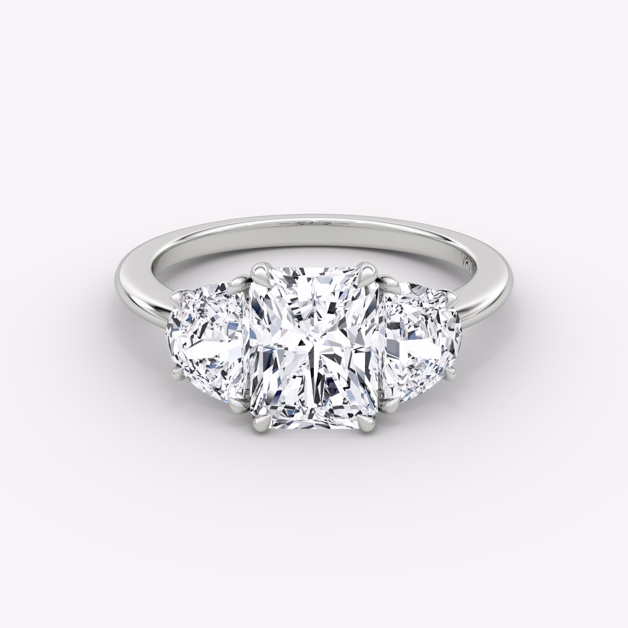 The Three Stone | Radiant | 18k | White Gold | bandAccent: Plain | sideStoneCarat: 0.50ct | sideStoneShape: Half Moon | diamondOrientation: vertical | caratWeight: other