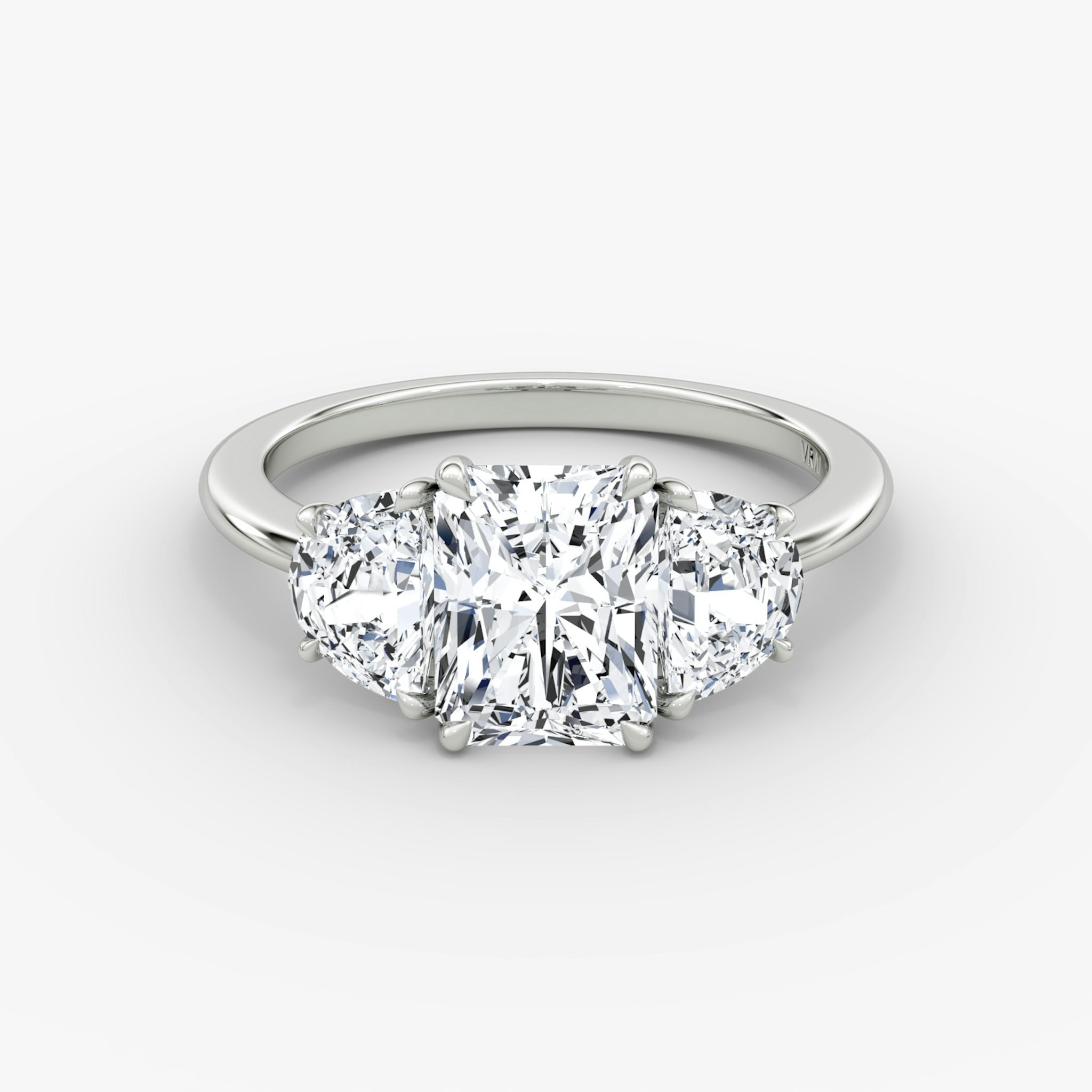 The Three Stone | Radiant | 18k | White Gold | bandAccent: Plain | sideStoneCarat: 0.50ct | sideStoneShape: Half Moon | diamondOrientation: vertical | caratWeight: other