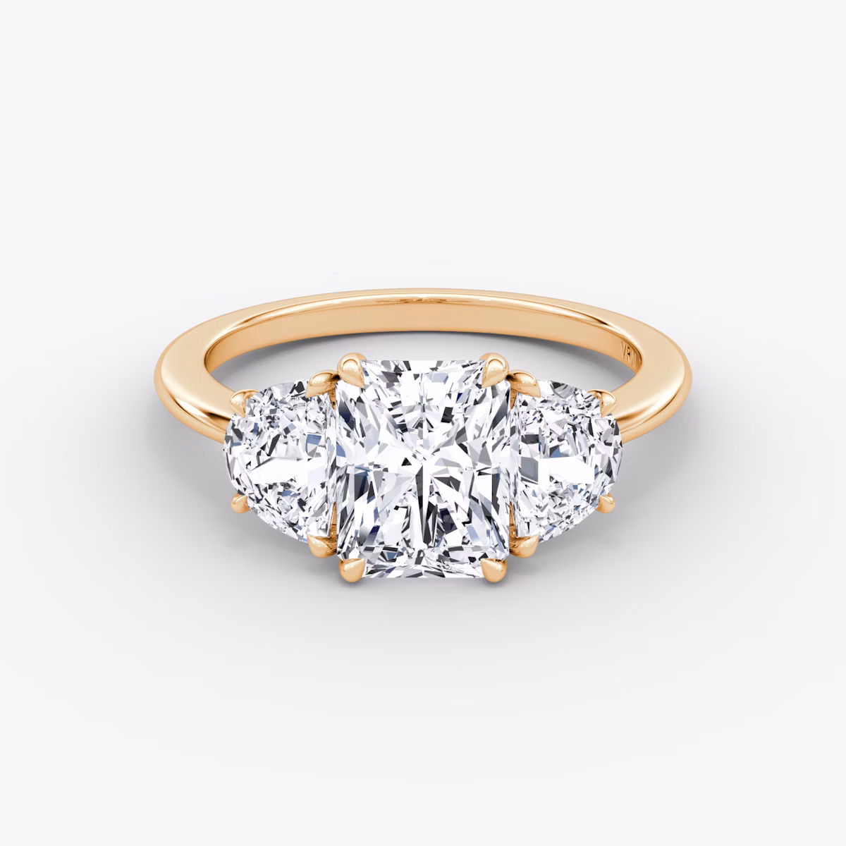 The Three Stone | Radiant | 14k | Rose Gold | bandAccent: Plain | sideStoneCarat: 0.50ct | sideStoneShape: Half Moon | diamondOrientation: vertical | caratWeight: other