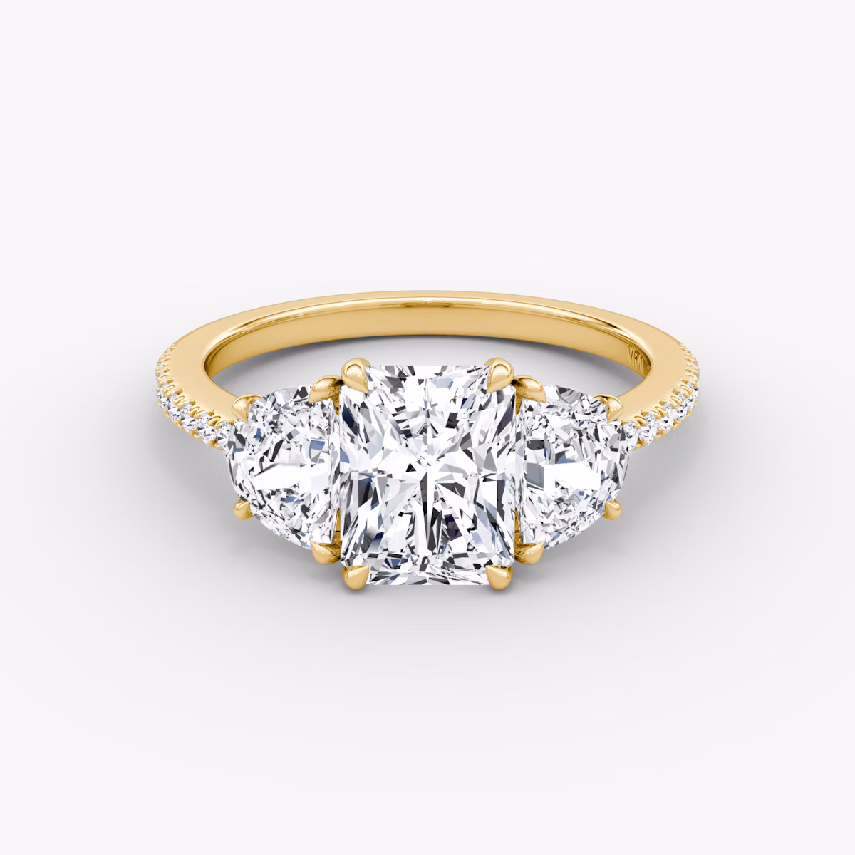 The Three Stone | Radiant | 18k | Yellow Gold | bandAccent: Pavé | sideStoneCarat: 0.50ct | sideStoneShape: Half Moon | diamondOrientation: vertical | caratWeight: other