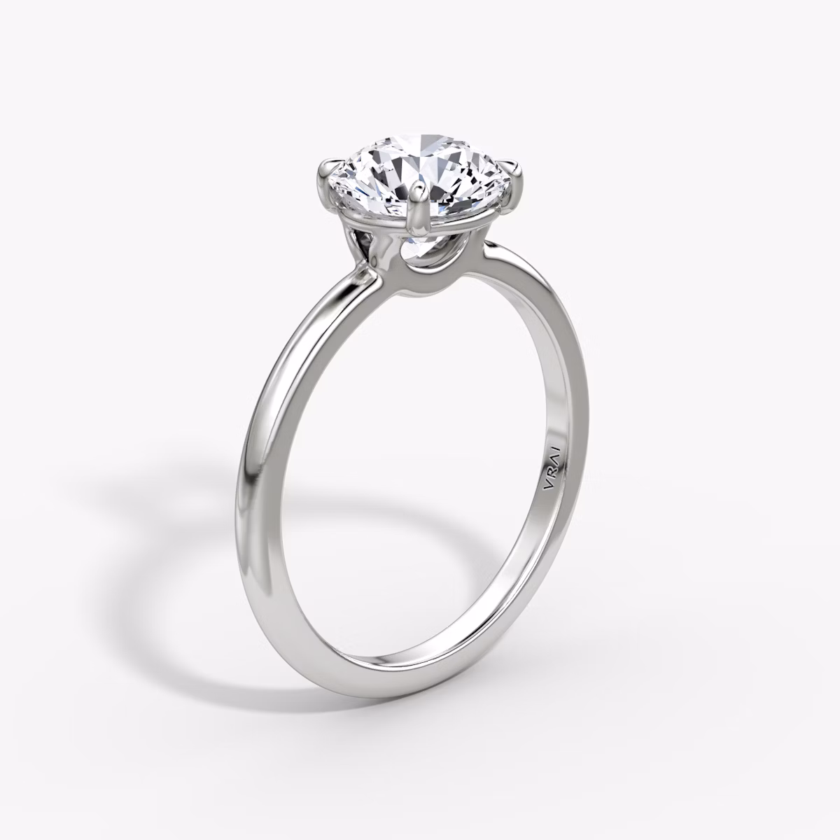 The Signature | Round Brilliant | 18k | White Gold | bandAccent: Plain | bandWidth: standard | caratWeight: other | hiddenHalo: no | diamondOrientation: vertical