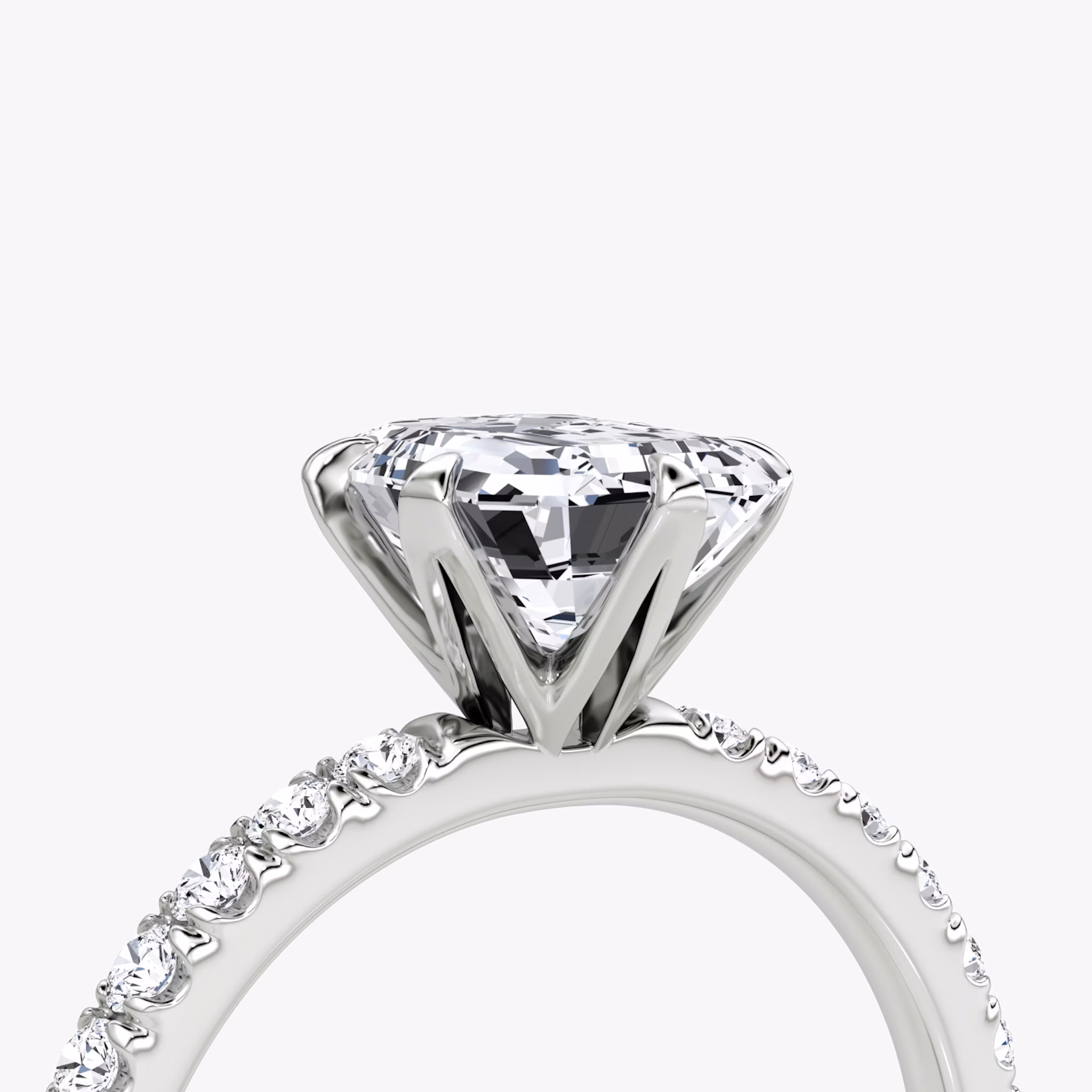 The V | Emerald | Platinum | bandAccent: Pavé | diamondOrientation: vertical | caratWeight: other