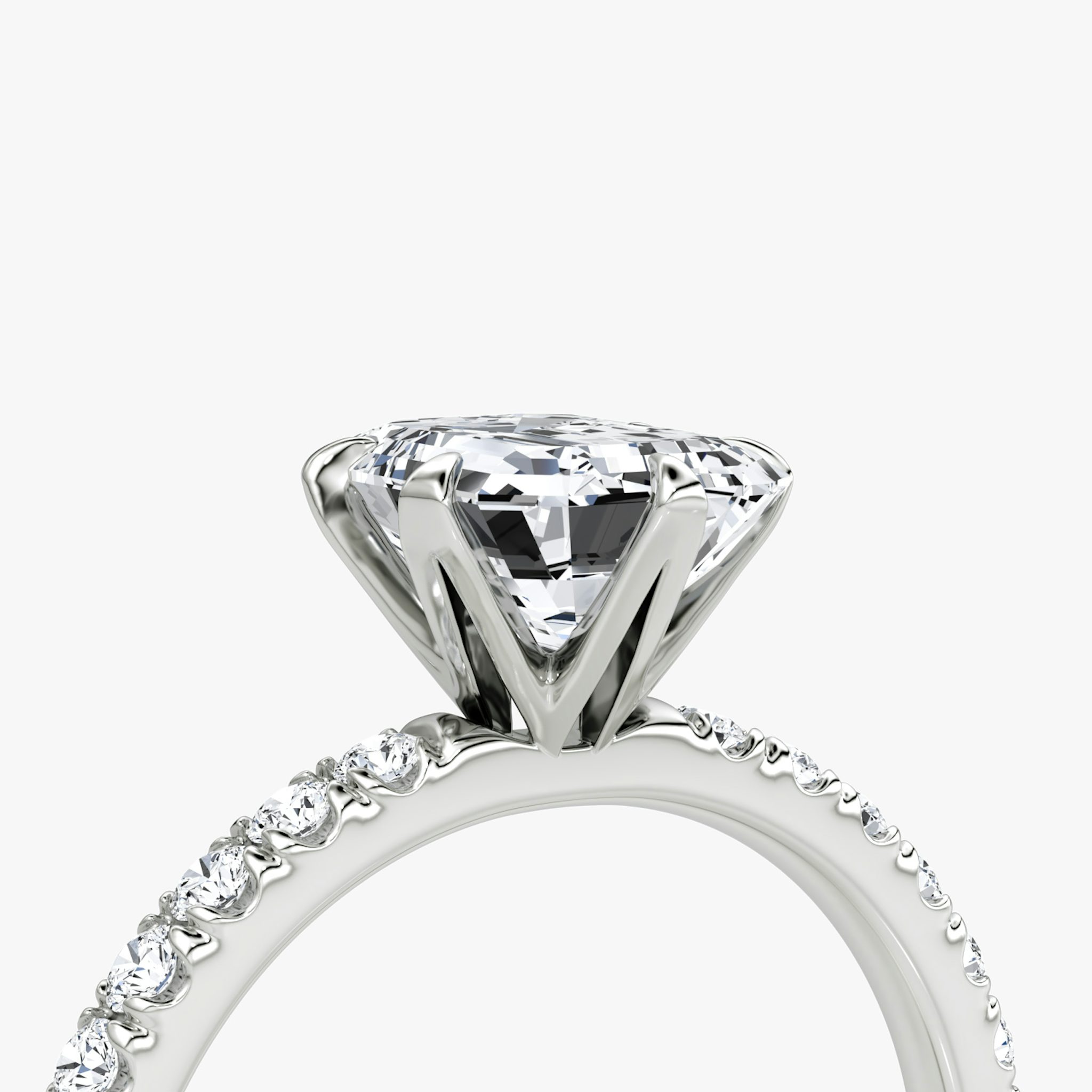 The V | Emerald | Platinum | bandAccent: Pavé | diamondOrientation: vertical | caratWeight: other