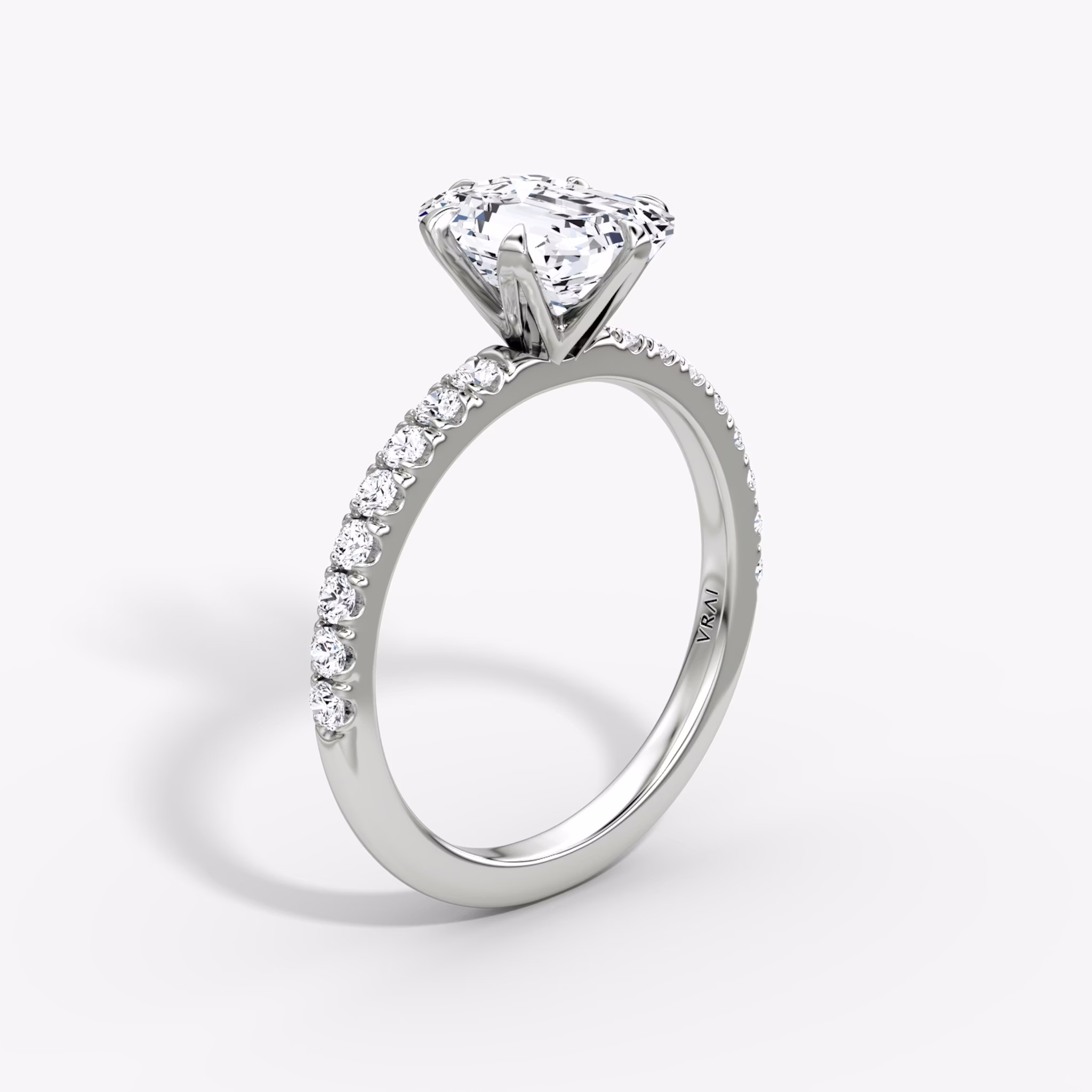 The V | Emerald | Platinum | bandAccent: Pavé | diamondOrientation: vertical | caratWeight: other