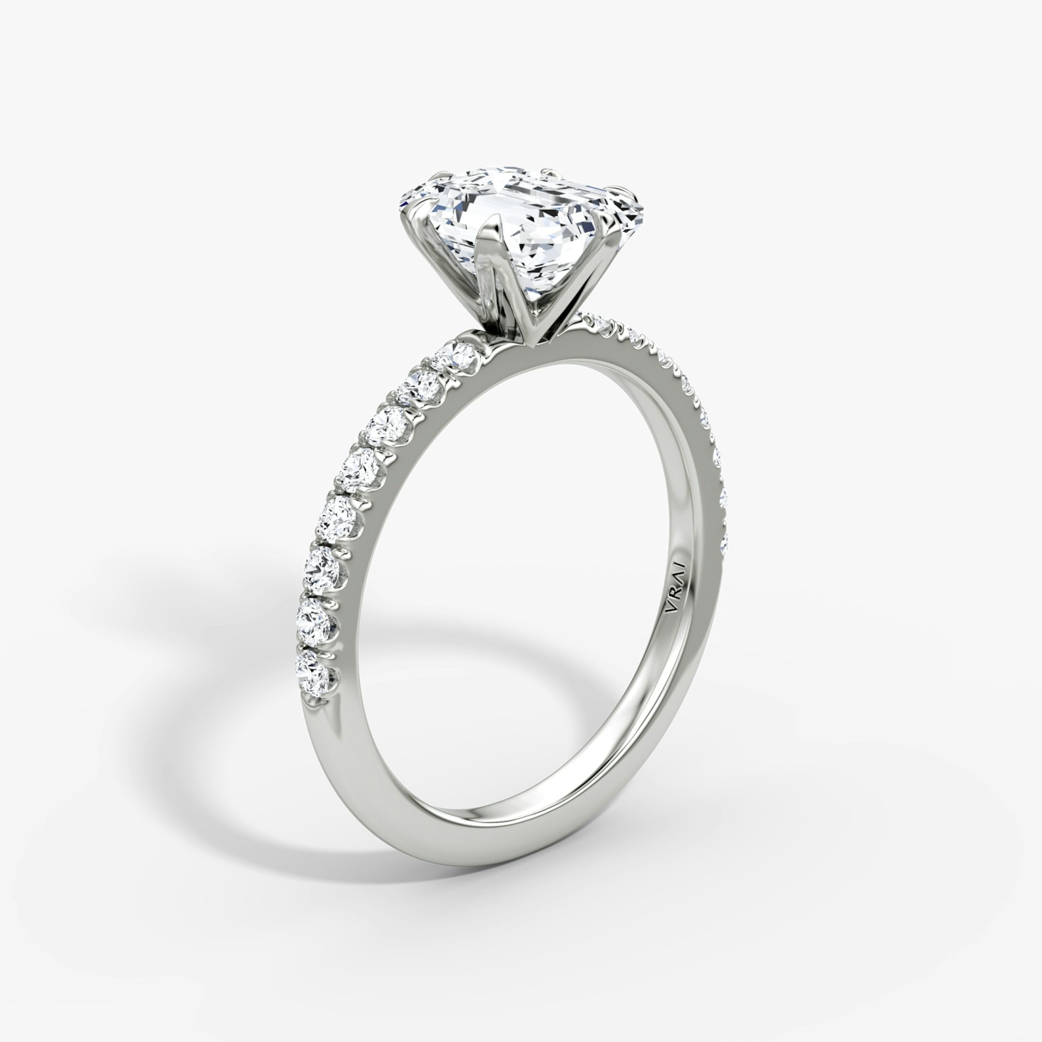The V | Emerald | Platinum | bandAccent: Pavé | diamondOrientation: vertical | caratWeight: other