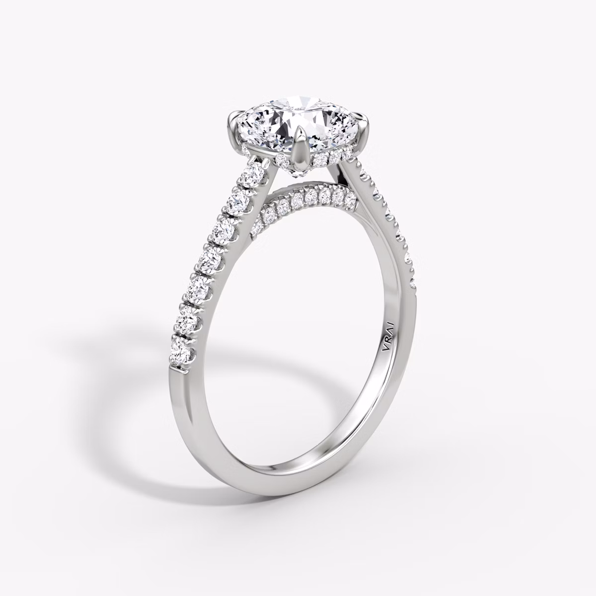 The Pavé Bridge | Emerald | Platinum | bandAccent: Pavé | diamondOrientation: vertical | caratWeight: other