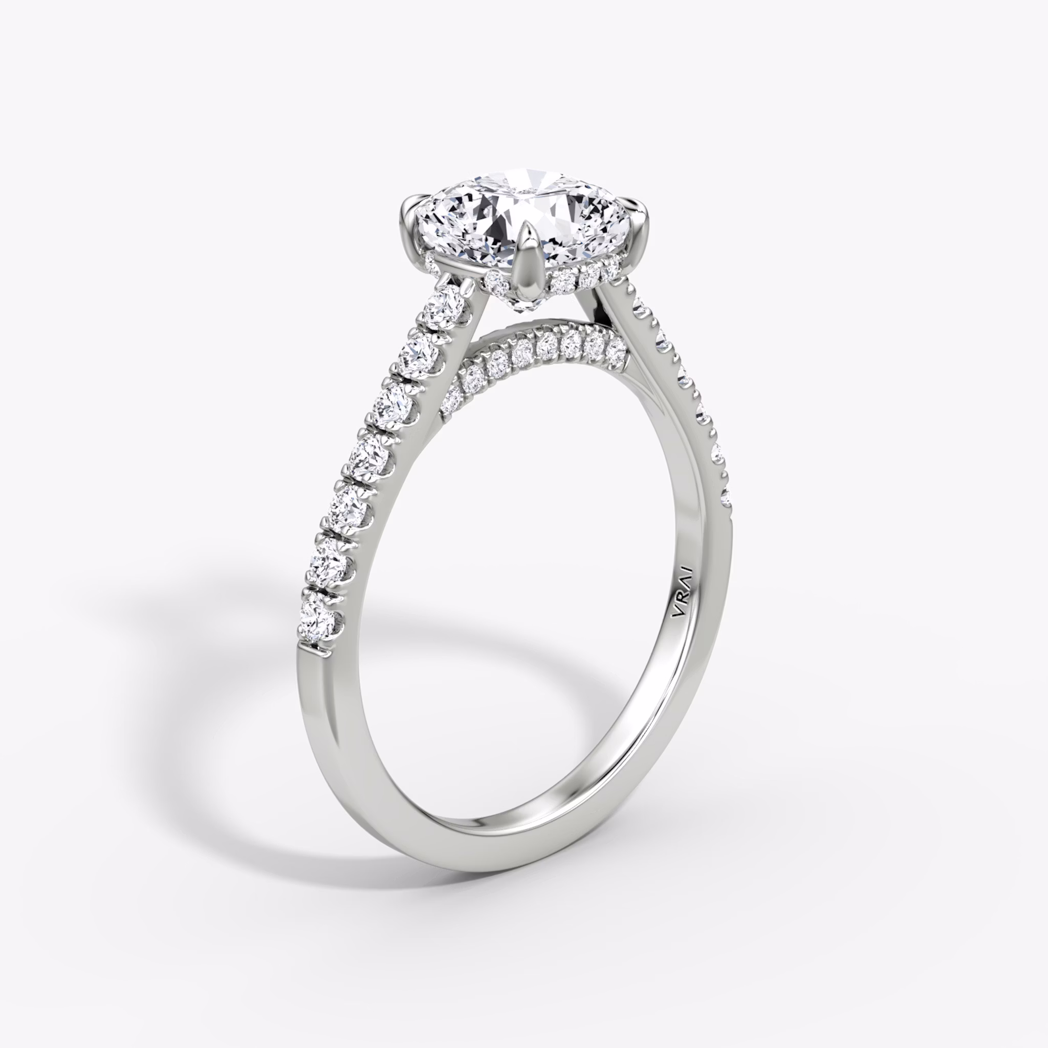 The Pavé Bridge | Emerald | 18k | White Gold | bandAccent: Pavé | diamondOrientation: vertical | caratWeight: other