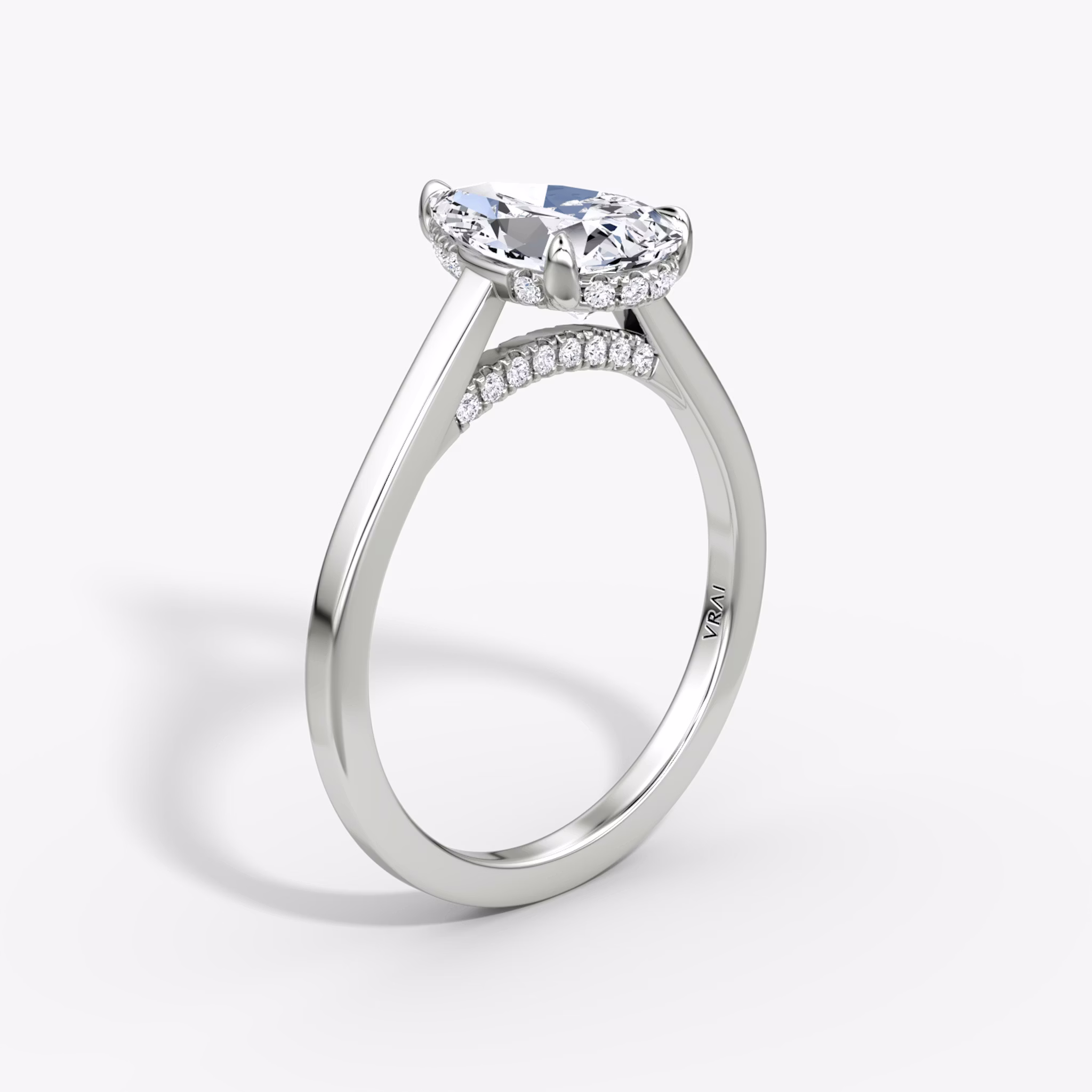 The Pavé Bridge | Pear | Platinum | bandAccent: Plain | diamond: Pear | diamondOrientation: vertical | caratWeight: other