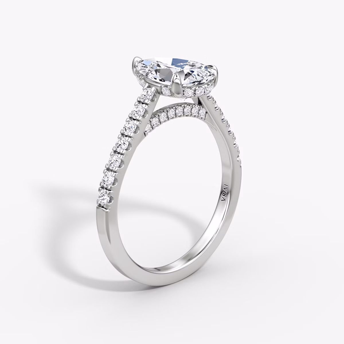 The Pavé Bridge | Pear | Platinum | bandAccent: Pavé | diamond: Pear | diamondOrientation: vertical | caratWeight: other