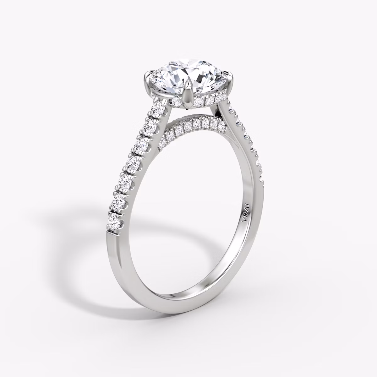 The Pavé Bridge | Round Brilliant | Platinum | bandAccent: Pavé | caratWeight: other | diamondOrientation: vertical