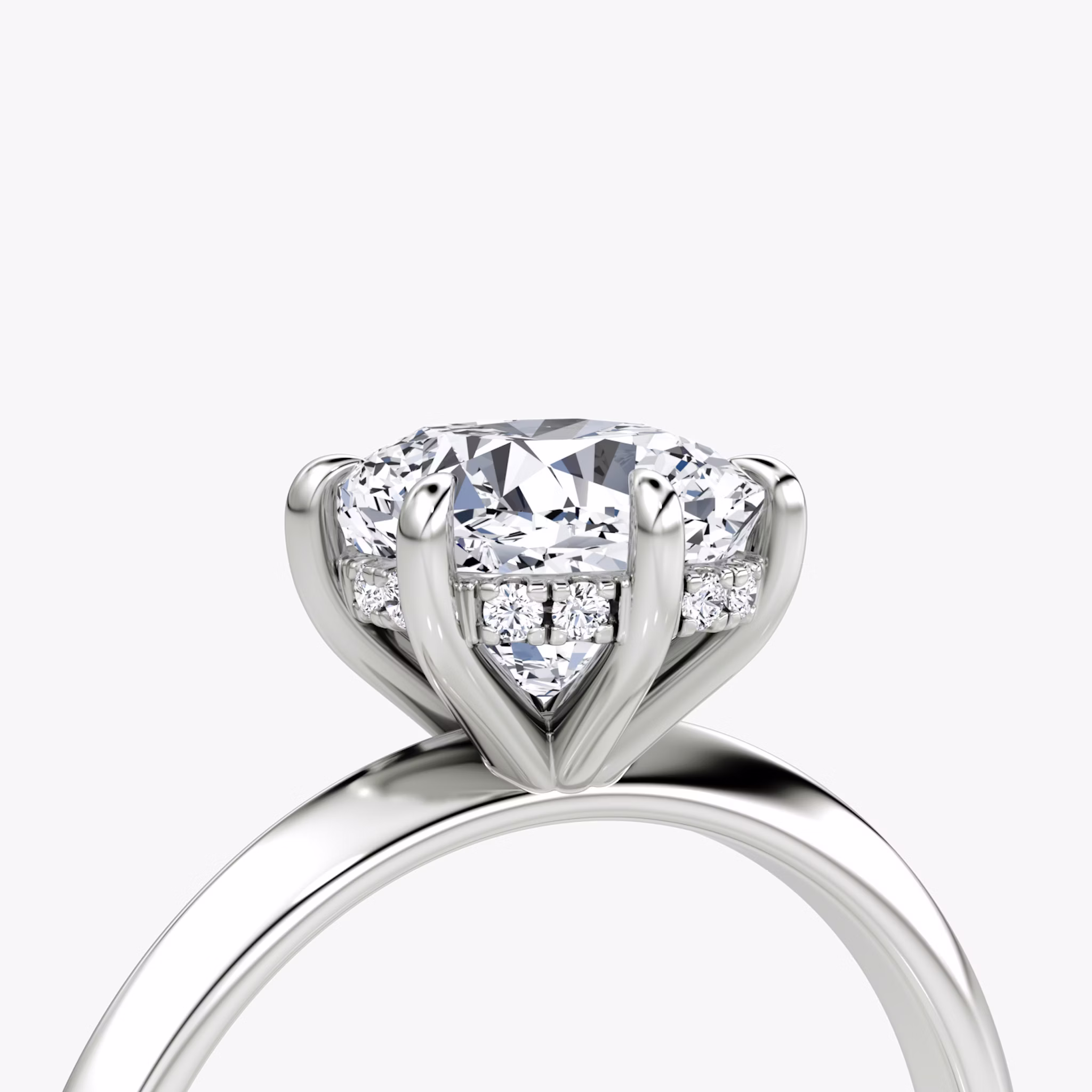 The Knife-Edge | Cushion | 18k | White Gold | bandAccent: Plain | hiddenHalo: yes | diamondOrientation: vertical | caratWeight: other