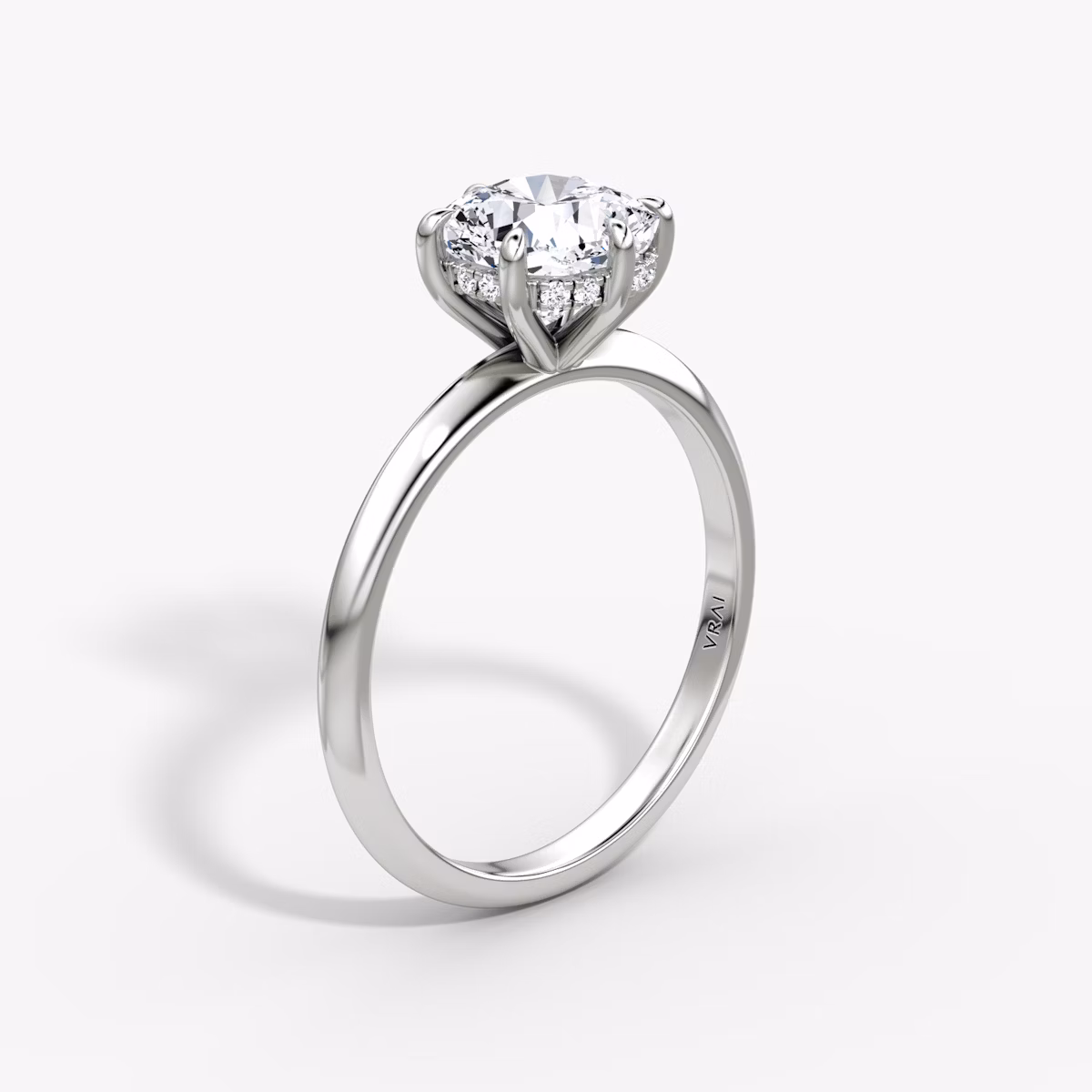 Anillo de compromiso Knife-Edge | Cojín | 18k | Oro blanco | bandAccent: Simple | hiddenHalo: yes | diamondOrientation: vertical | caratWeight: other