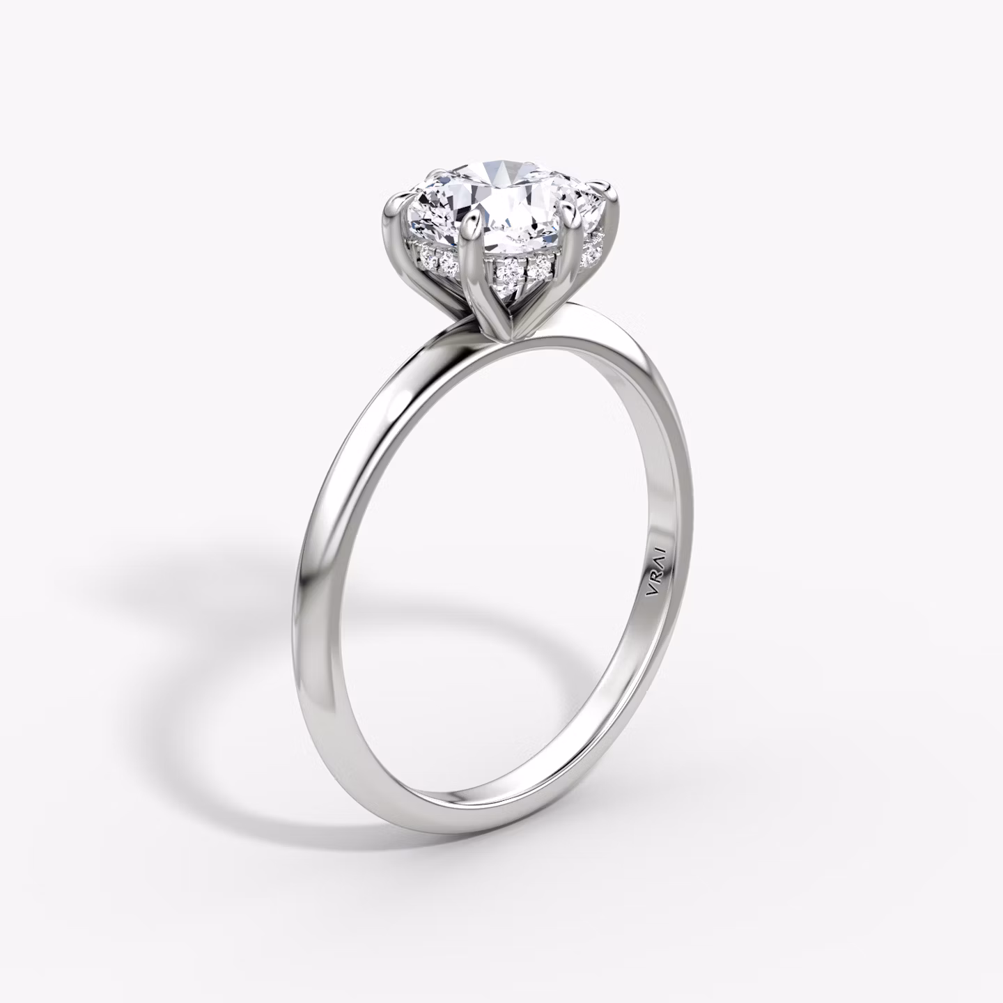 The Knife-Edge | Cushion | Platinum | bandAccent: Plain | hiddenHalo: yes | diamondOrientation: vertical | caratWeight: other