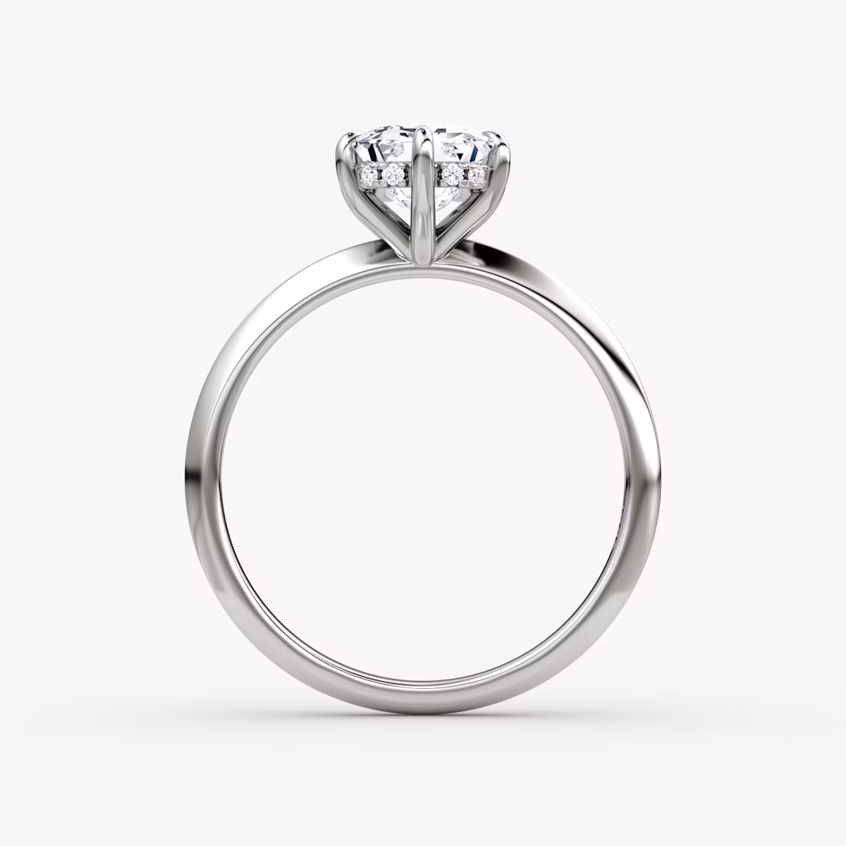 The Knife-Edge | Emerald | Platinum | bandAccent: Plain | hiddenHalo: yes | diamondOrientation: vertical | caratWeight: other