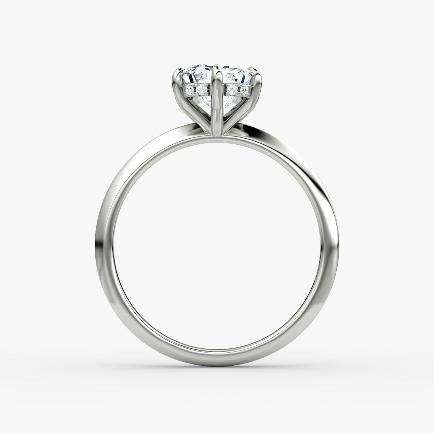 The Knife-Edge | Emerald | Platinum | bandAccent: Plain | hiddenHalo: yes | diamondOrientation: vertical | caratWeight: other