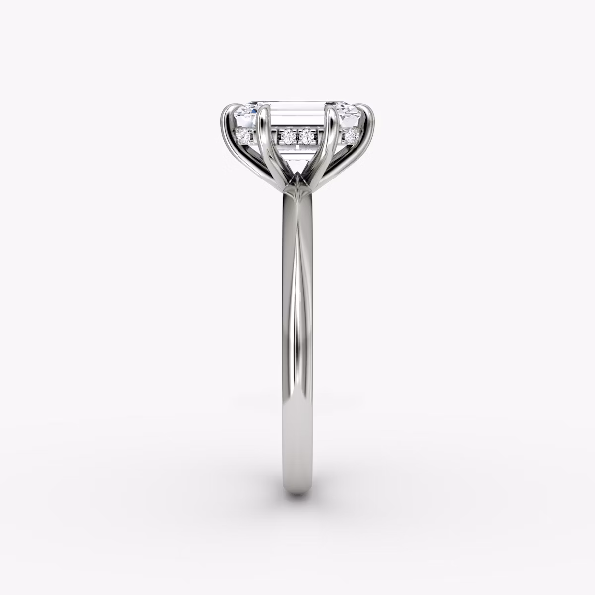 The Knife-Edge | Emerald | Platinum | bandAccent: Plain | hiddenHalo: yes | diamondOrientation: vertical | caratWeight: other