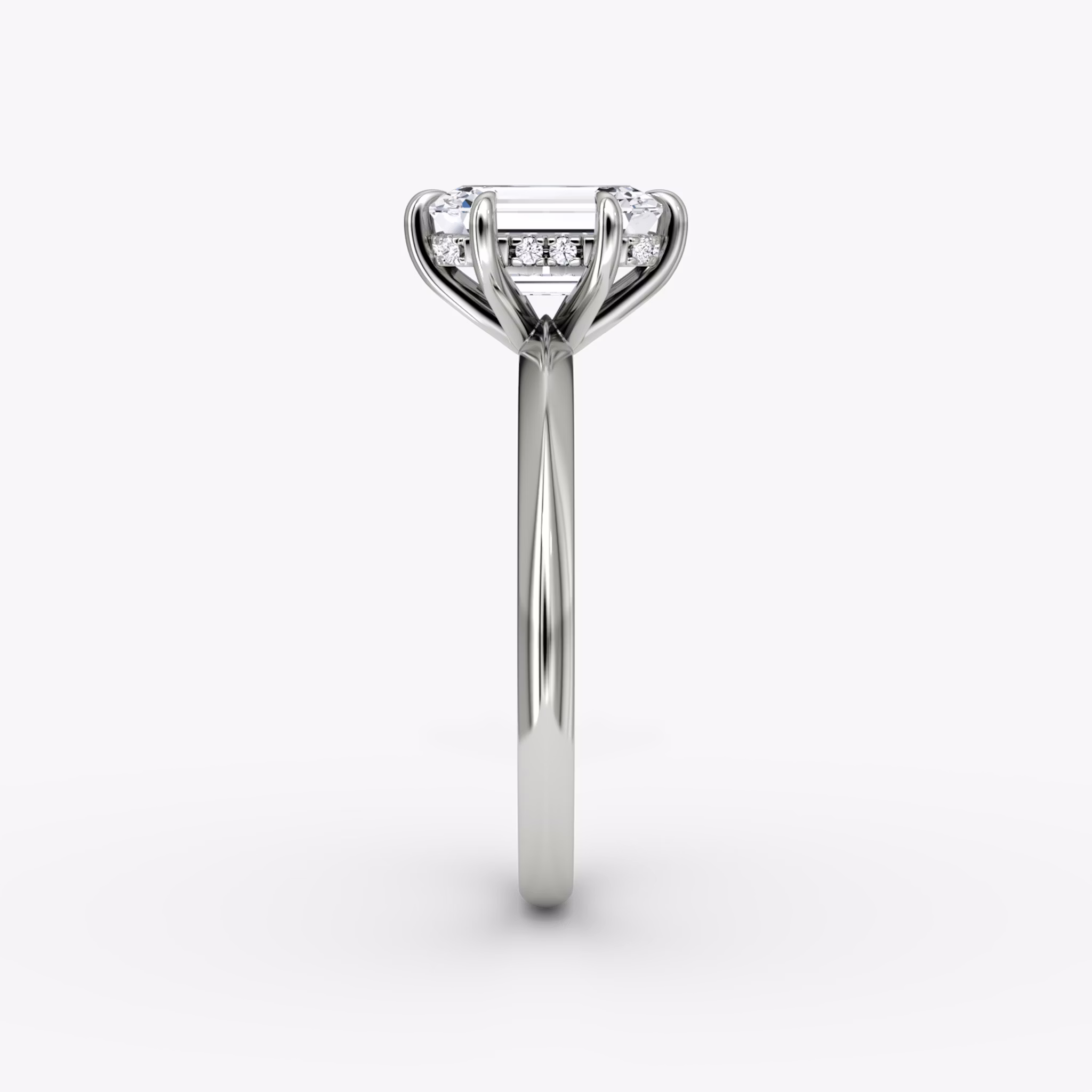 The Knife-Edge | Emerald | 18k | White Gold | bandAccent: Plain | hiddenHalo: yes | diamondOrientation: vertical | caratWeight: other