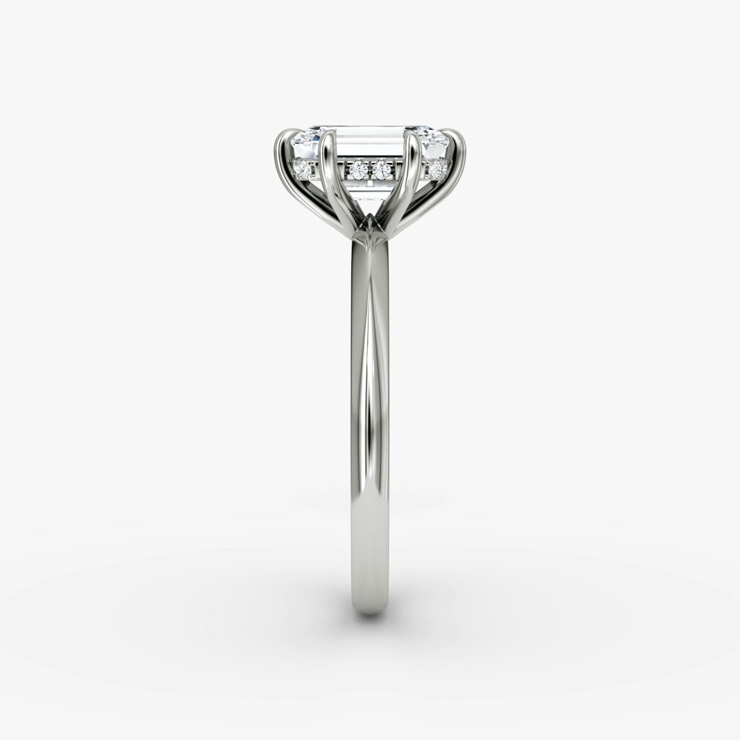 The Knife-Edge | Emerald | Platinum | bandAccent: Plain | hiddenHalo: yes | diamondOrientation: vertical | caratWeight: other
