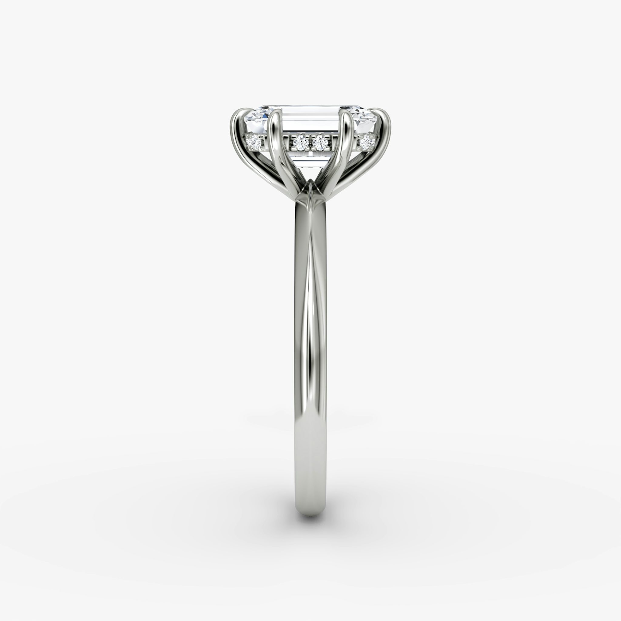 The Knife-Edge | Emerald | 18k | White Gold | bandAccent: Plain | hiddenHalo: yes | diamondOrientation: vertical | caratWeight: other