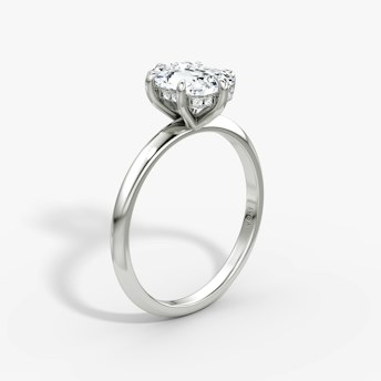 The Knife-Edge Emerald White Gold Engagement Ring.