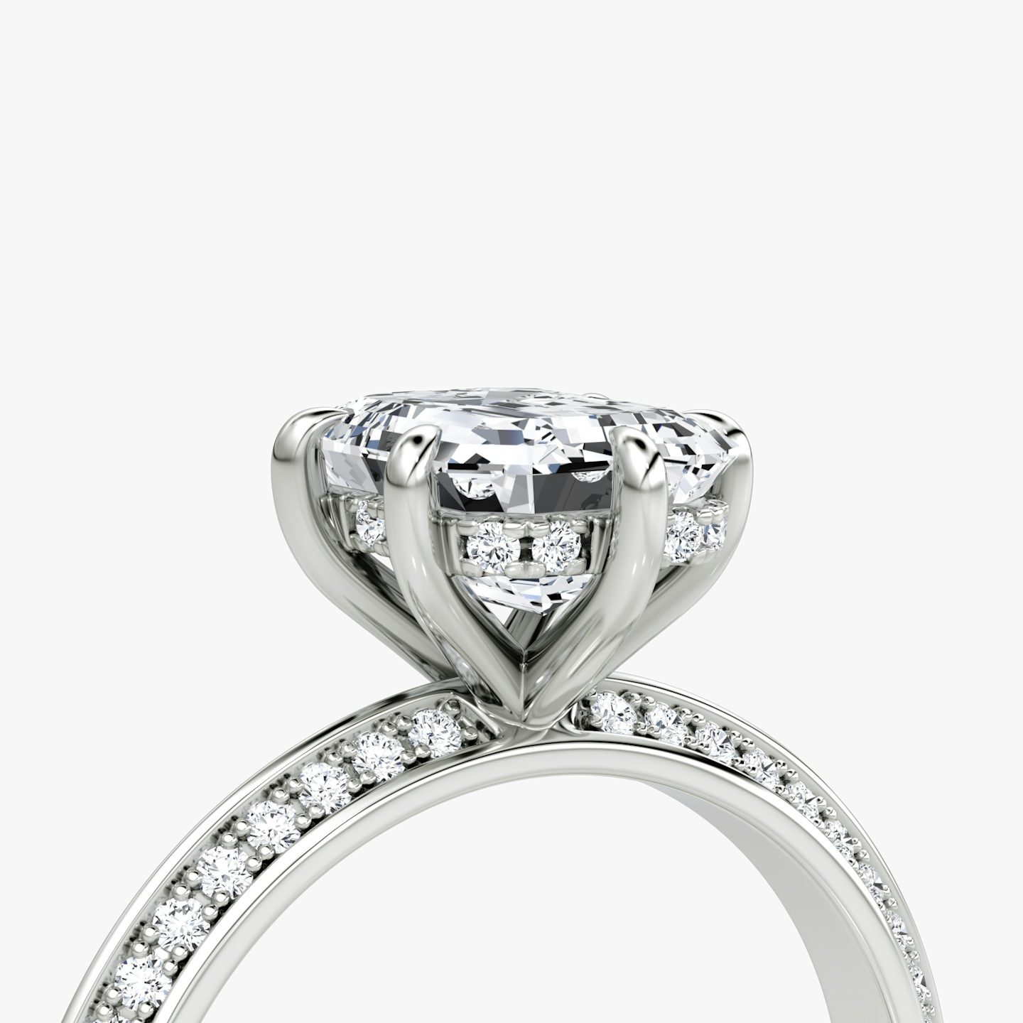 Knife-Edge | Emerald | Platin | bandAccent: Mit Pavé-Besatz | hiddenHalo: yes | diamondOrientation: vertical | caratWeight: other