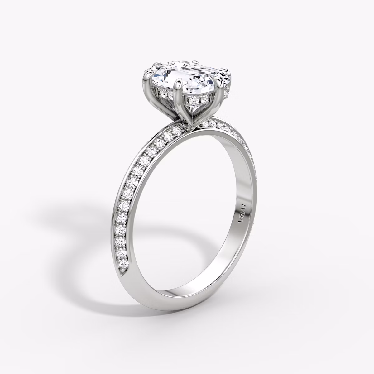 The Knife-Edge | Emerald | 18k | White Gold | bandAccent: Pavé | hiddenHalo: yes | diamondOrientation: vertical | caratWeight: other