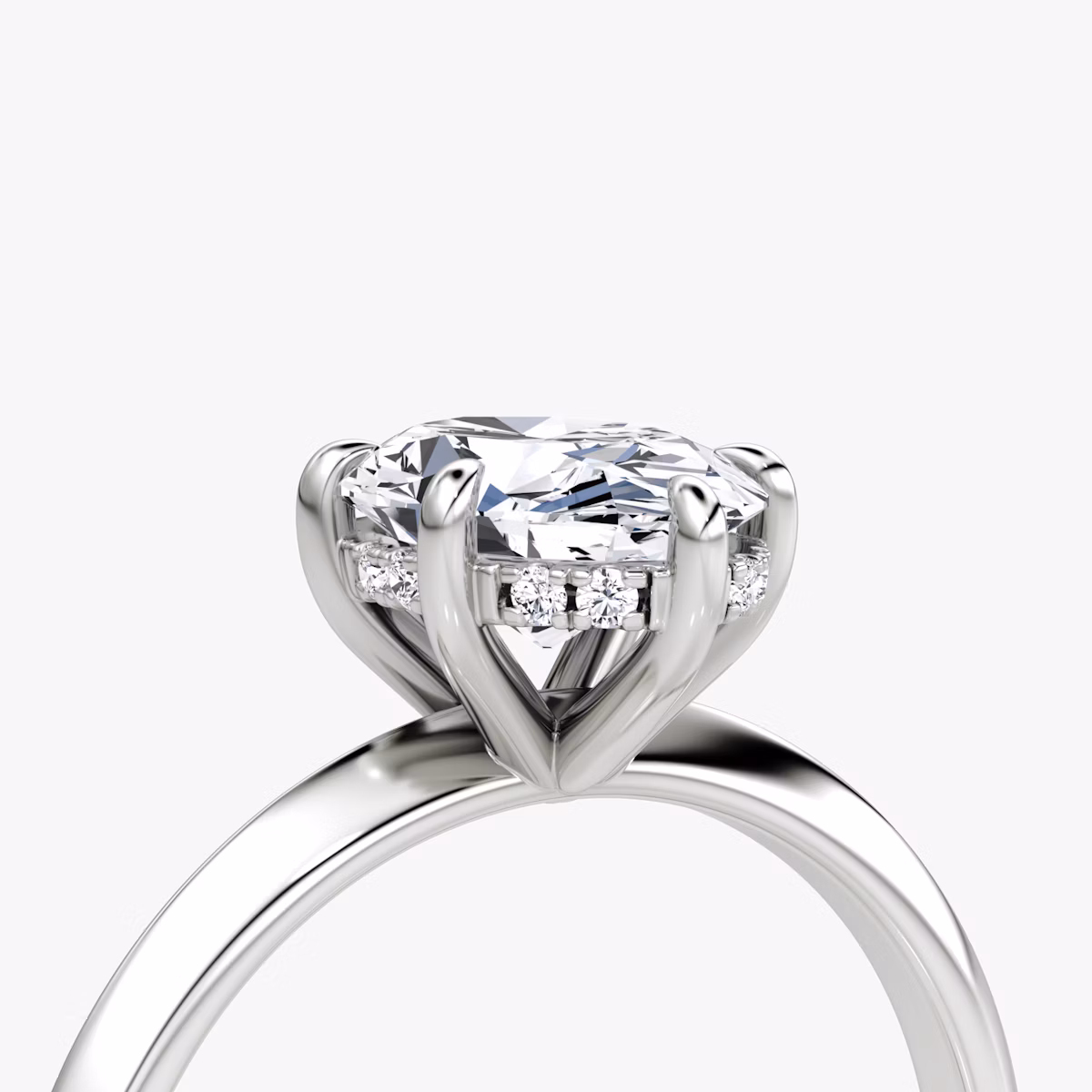 The Knife-Edge | Oval | Platinum | bandAccent: Plain | hiddenHalo: yes | diamondOrientation: vertical | caratWeight: other