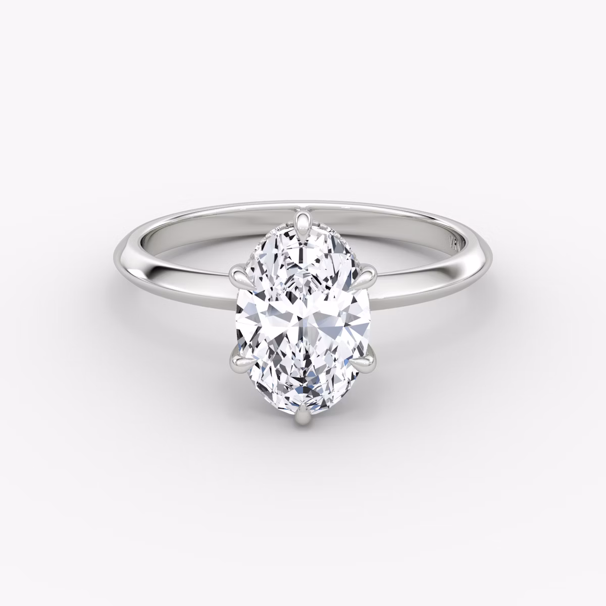 The Knife-Edge | Oval | Platinum | bandAccent: Plain | hiddenHalo: yes | diamondOrientation: vertical | caratWeight: other