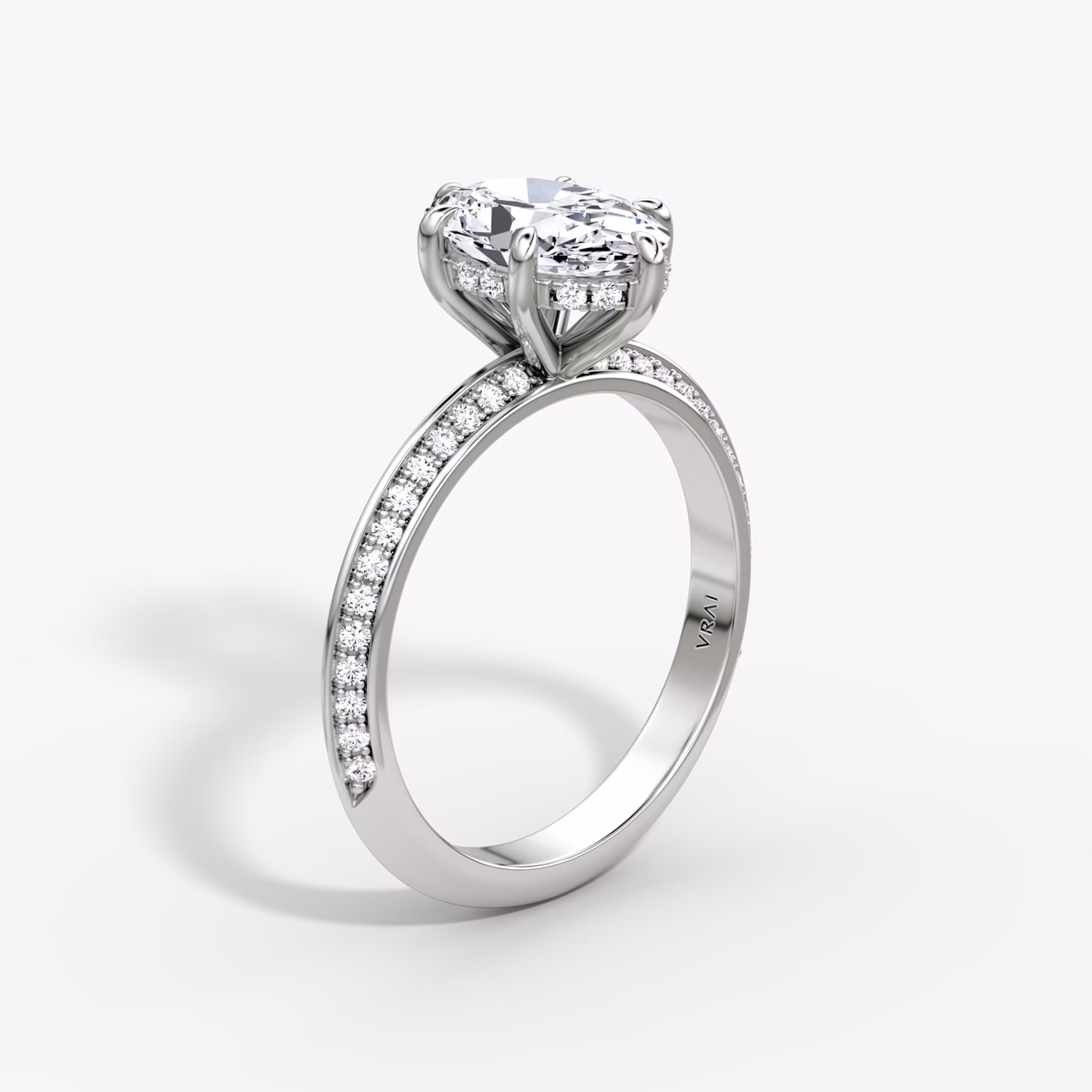 knife edge hidden halo engagement ring oval pave white gold