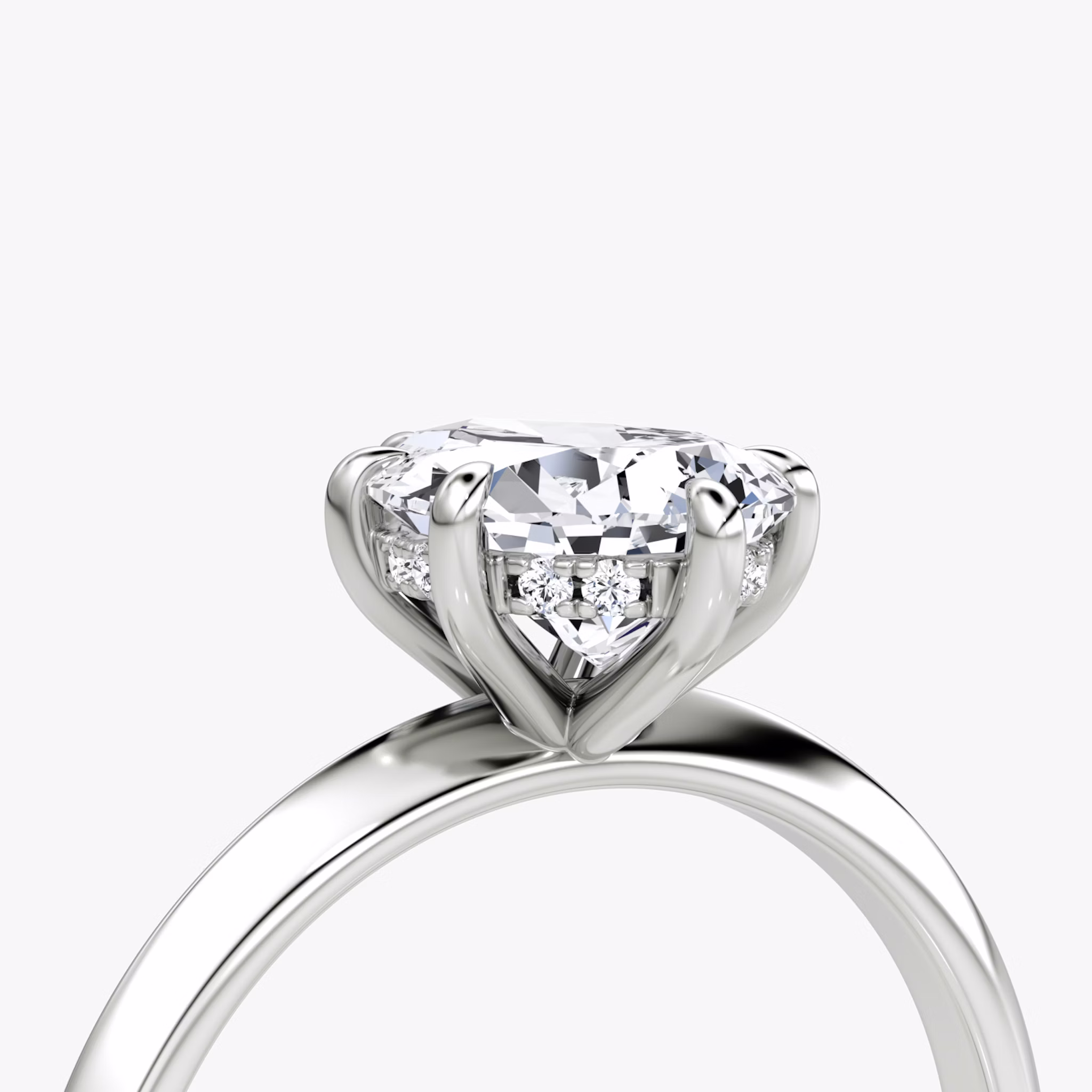 The Knife-Edge | Pear | 18k | White Gold | bandAccent: Plain | hiddenHalo: yes | diamondOrientation: vertical | caratWeight: other