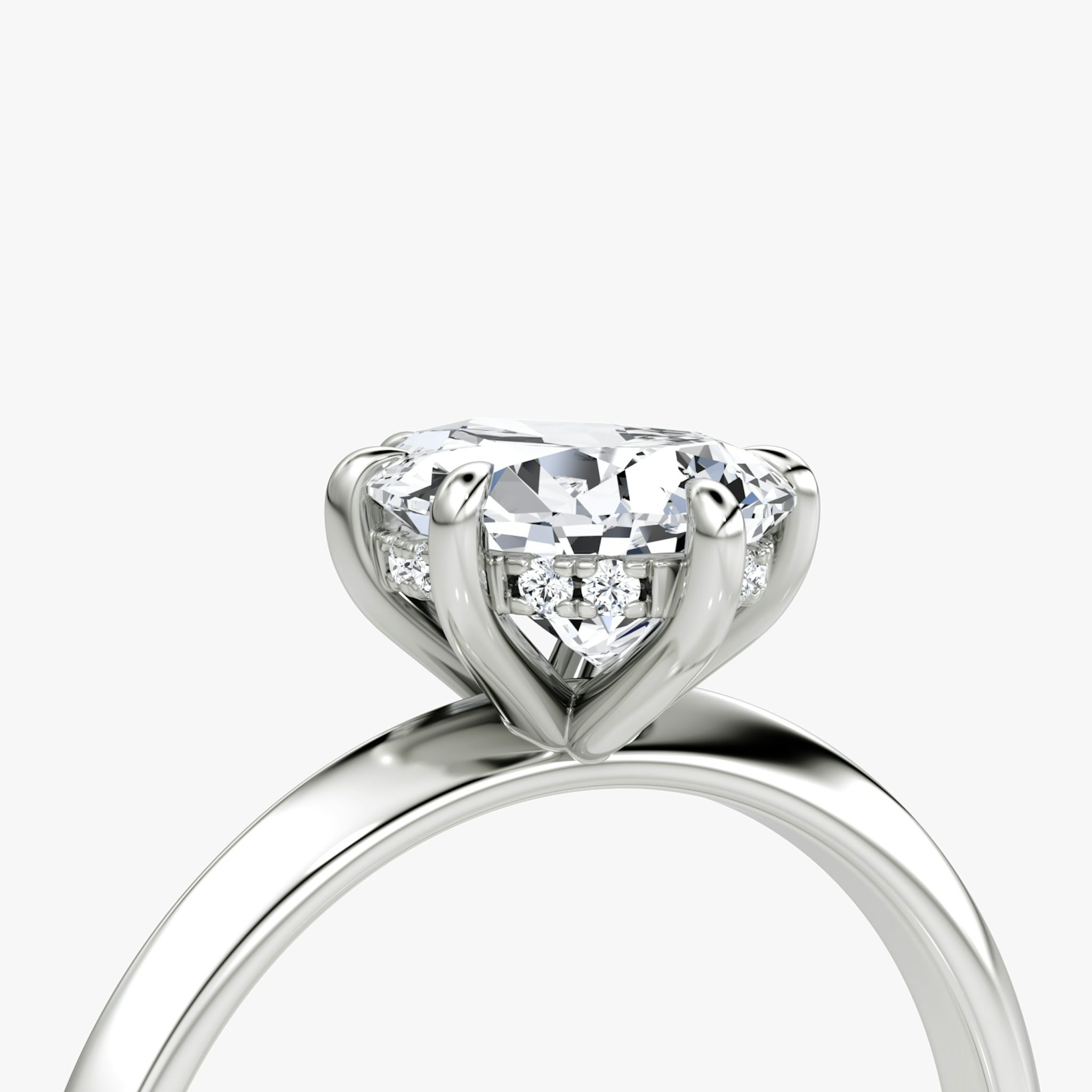 The Knife-Edge | Pear | 18k | White Gold | bandAccent: Plain | hiddenHalo: yes | diamondOrientation: vertical | caratWeight: other