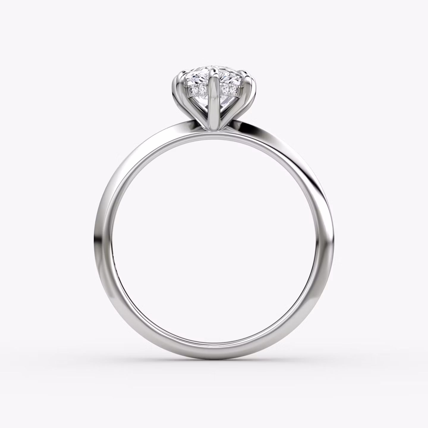 The Knife-Edge | Pear | Platinum | bandAccent: Plain | hiddenHalo: yes | diamondOrientation: vertical | caratWeight: other