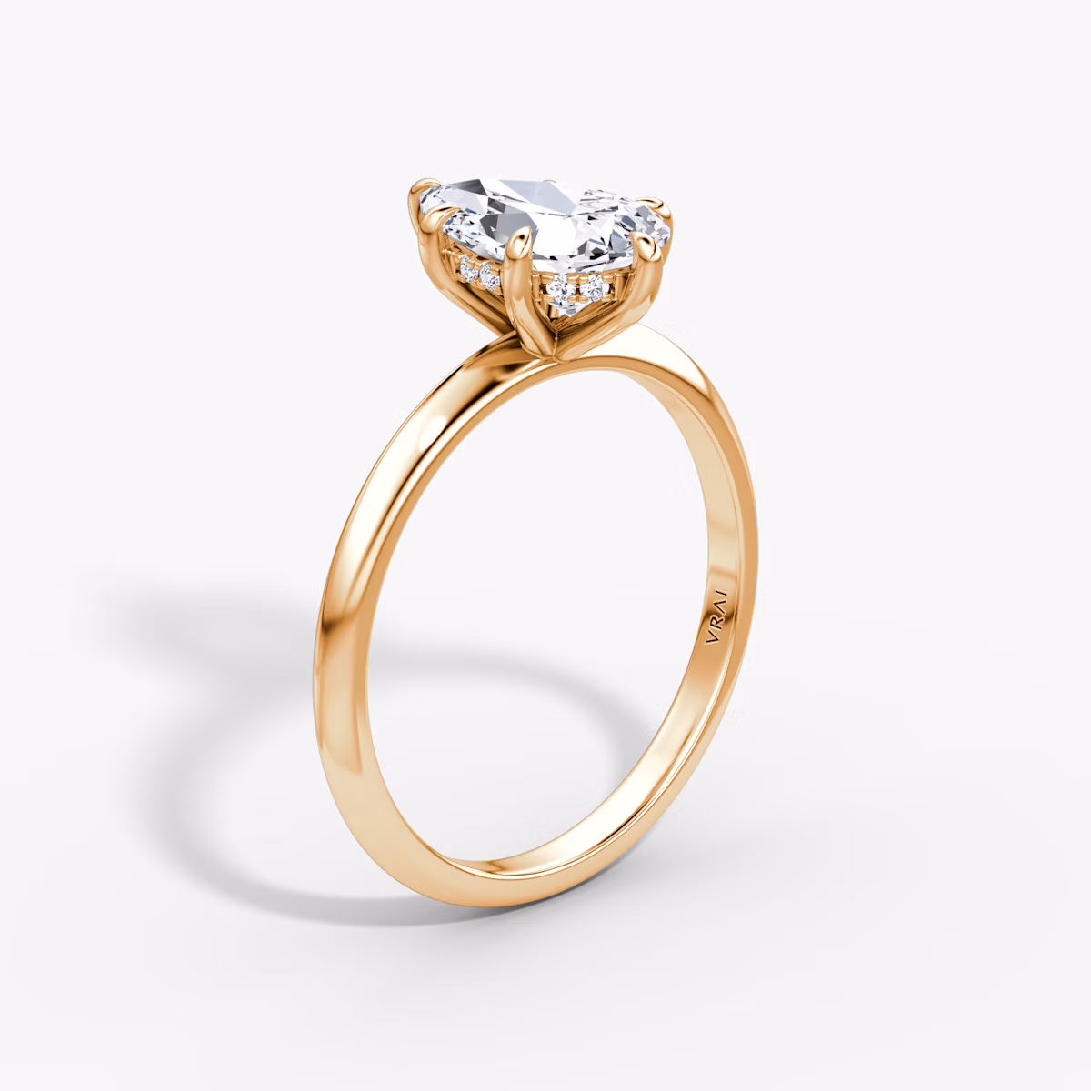 The Knife-Edge | Pear | 14k | Rose Gold | bandAccent: Plain | hiddenHalo: yes | diamondOrientation: vertical | caratWeight: other