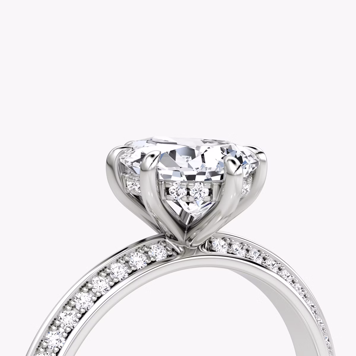 The Knife-Edge | Pear | Platinum | bandAccent: Pavé | hiddenHalo: yes | diamondOrientation: vertical | caratWeight: other